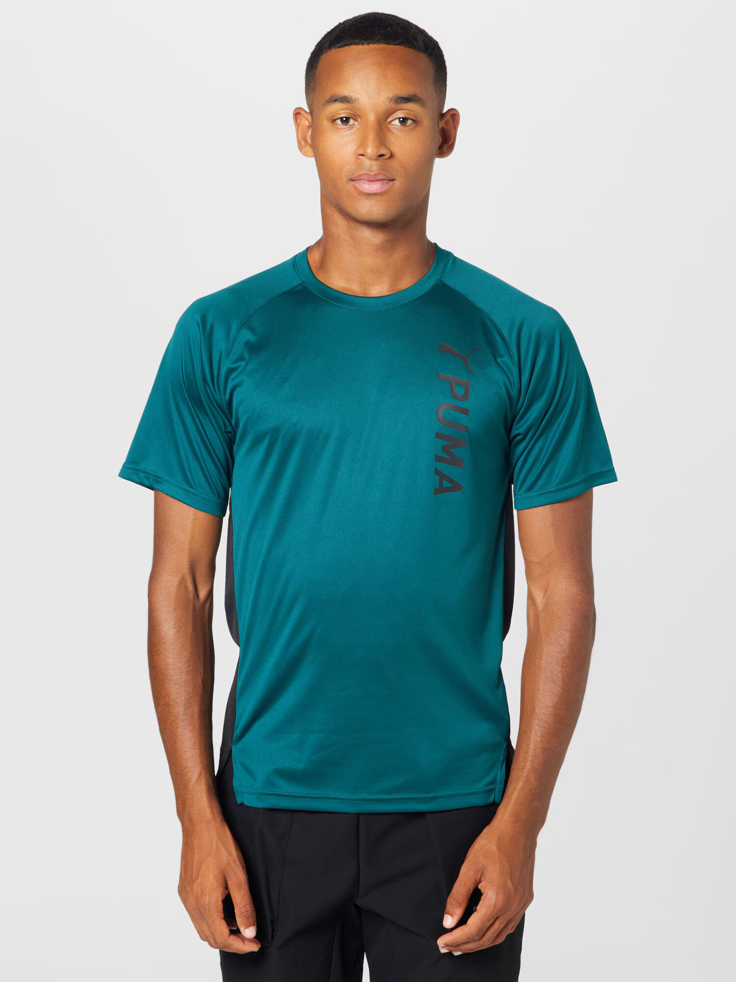 PUMA Tricou funcțional verde smarald / negru - Pled.ro