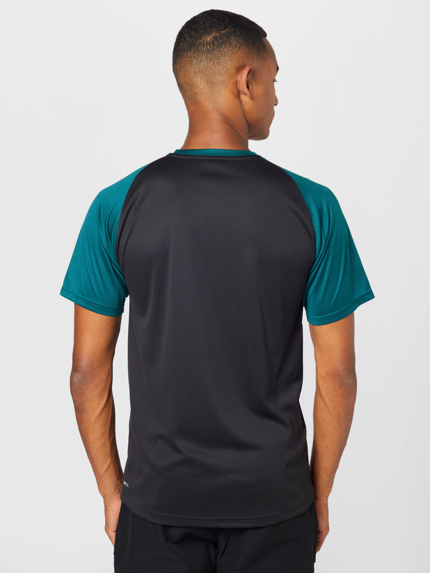 PUMA Tricou funcțional verde smarald / negru - Pled.ro