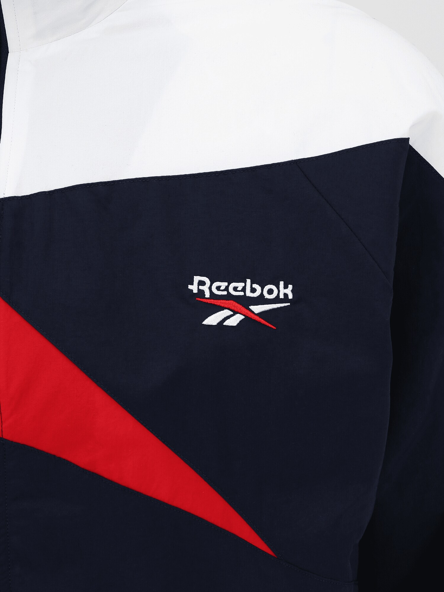 Reebok Classics Geacă de primăvară-toamnă bleumarin / roșu / alb - Pled.ro