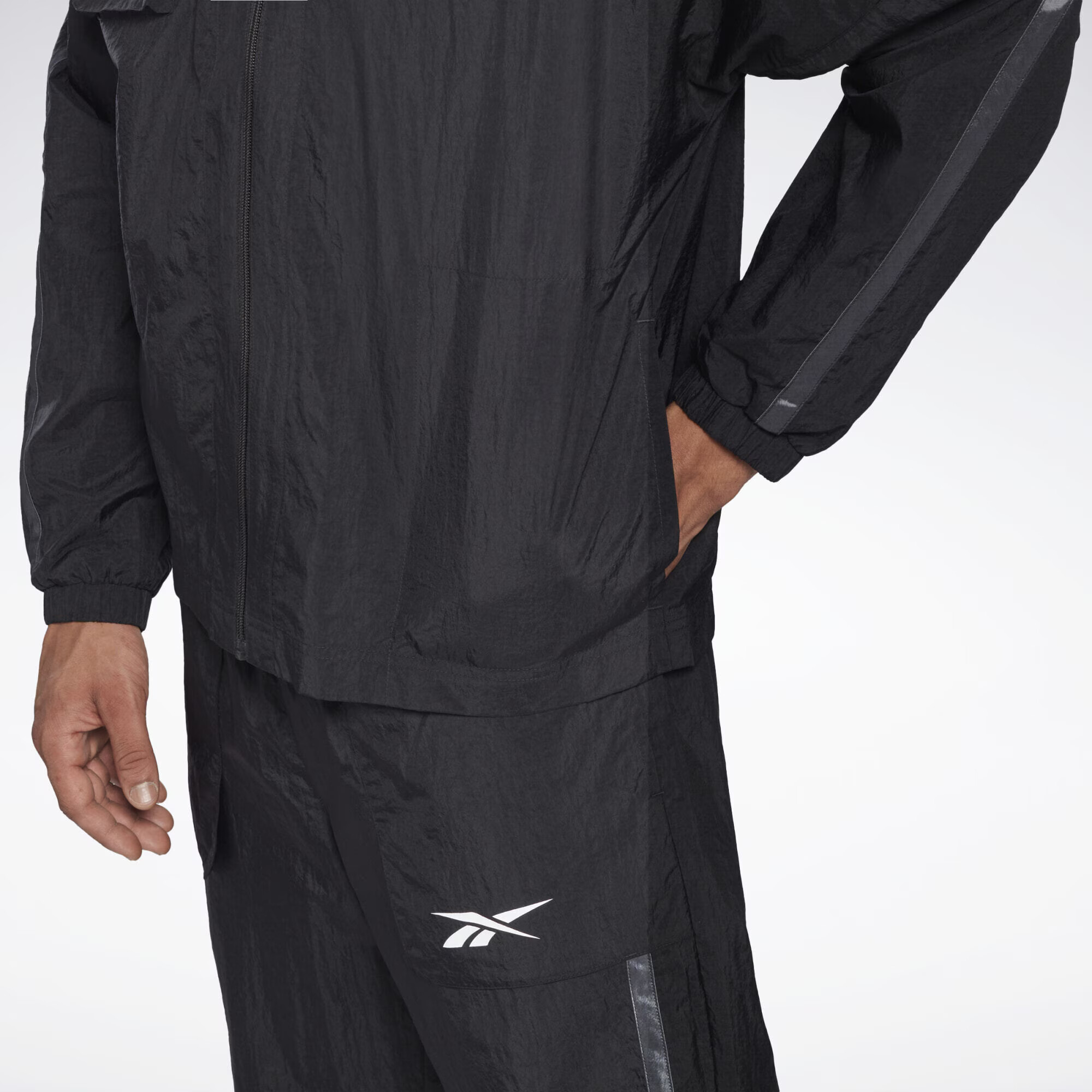 Reebok Sport Geacă sport gri / negru / alb - Pled.ro