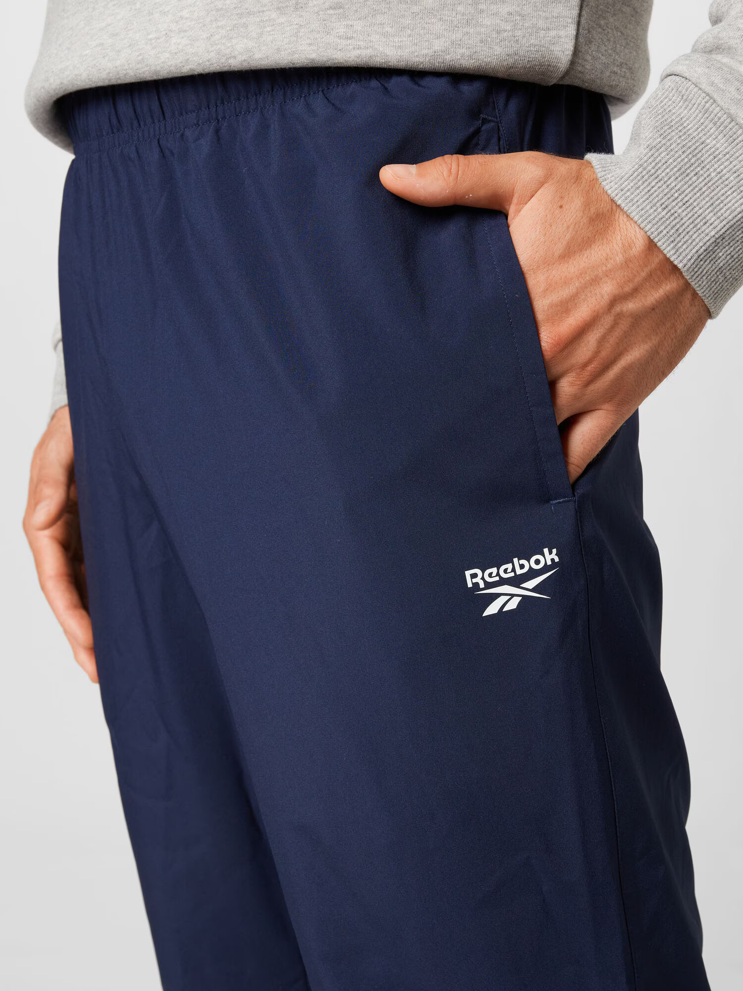 Reebok Sport Pantaloni sport albastru închis / alb - Pled.ro