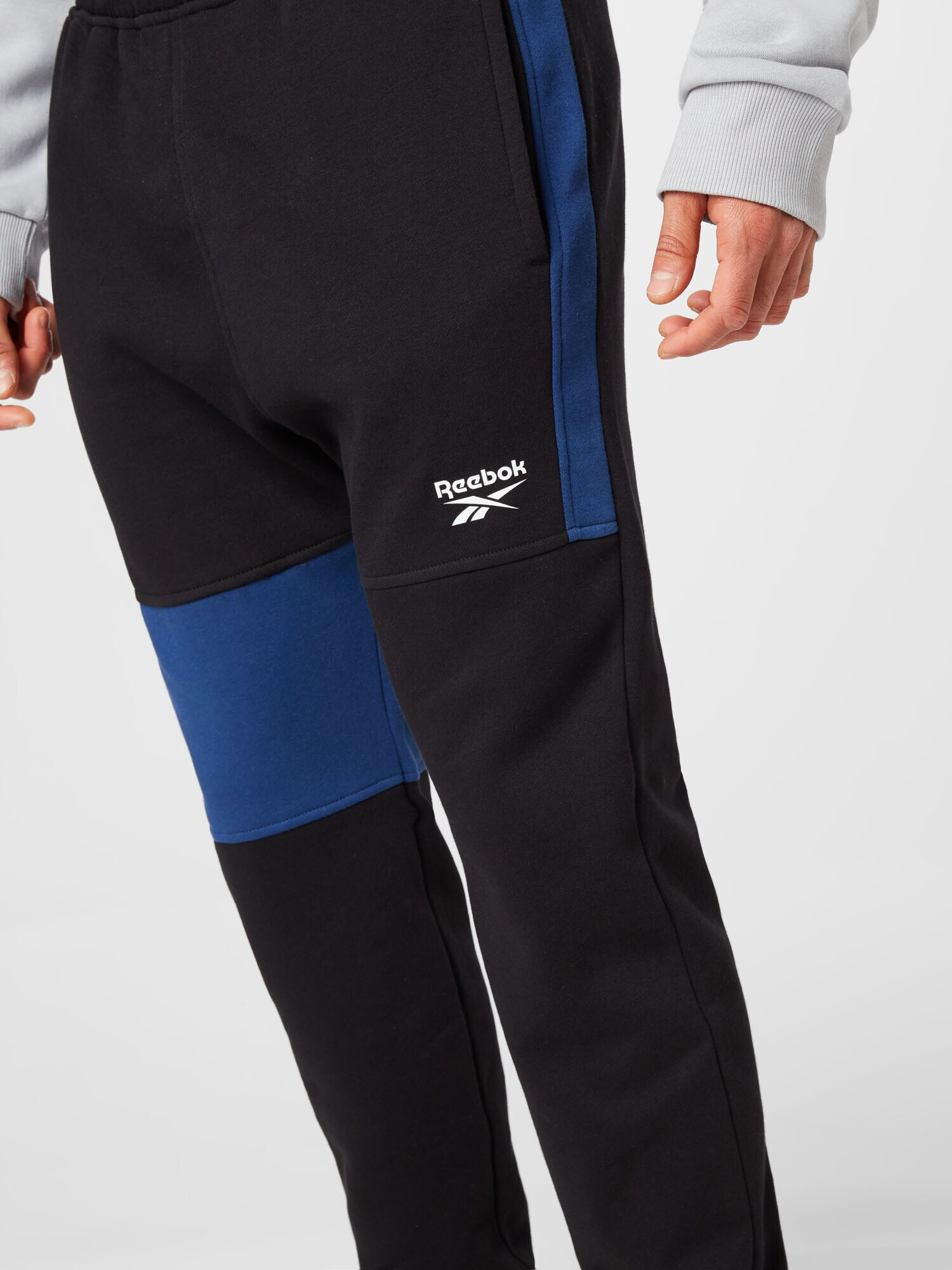 Reebok Sport Pantaloni sport albastru / negru / alb - Pled.ro