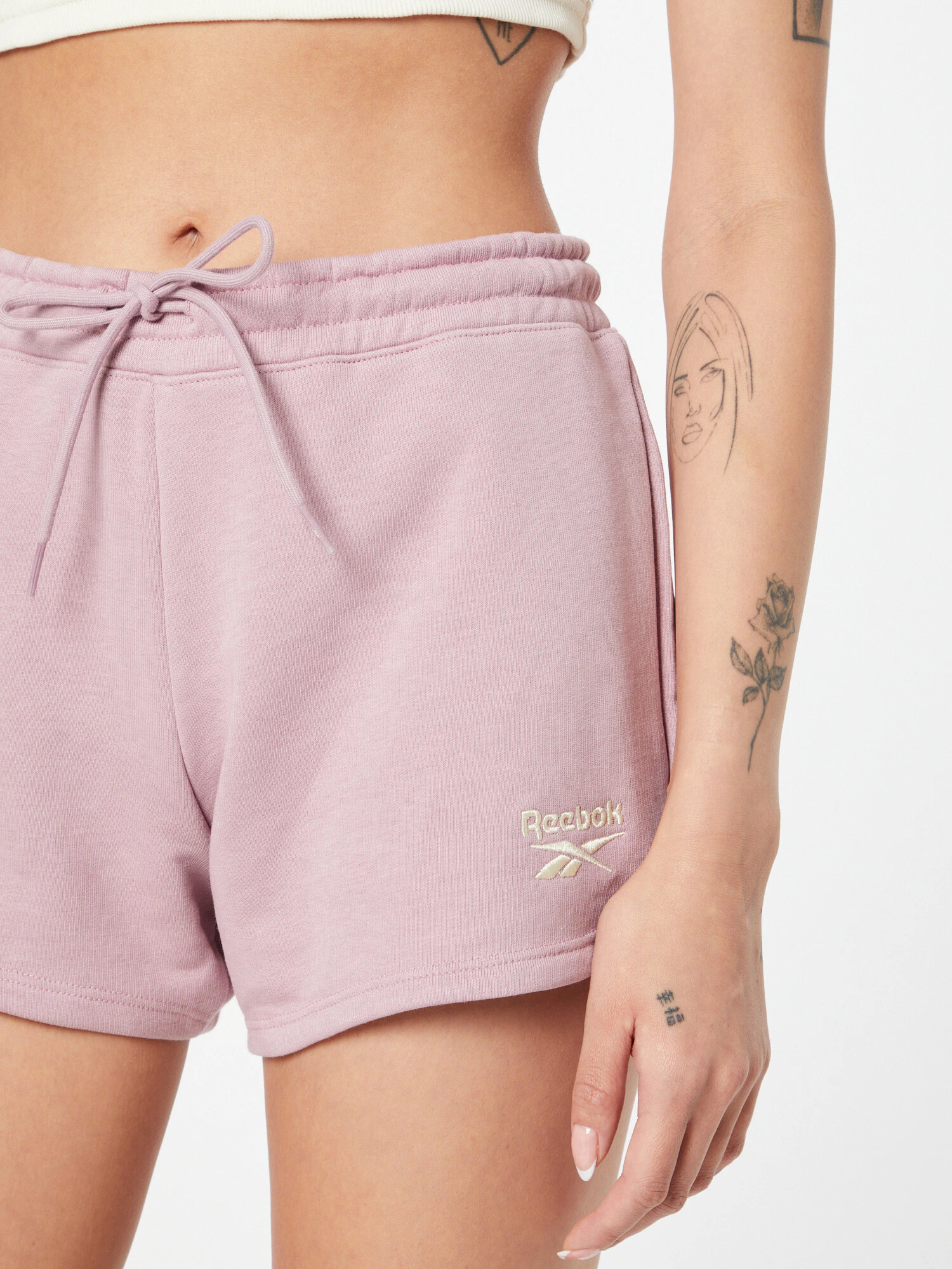 Reebok Sport Pantaloni sport bej / mov pastel - Pled.ro