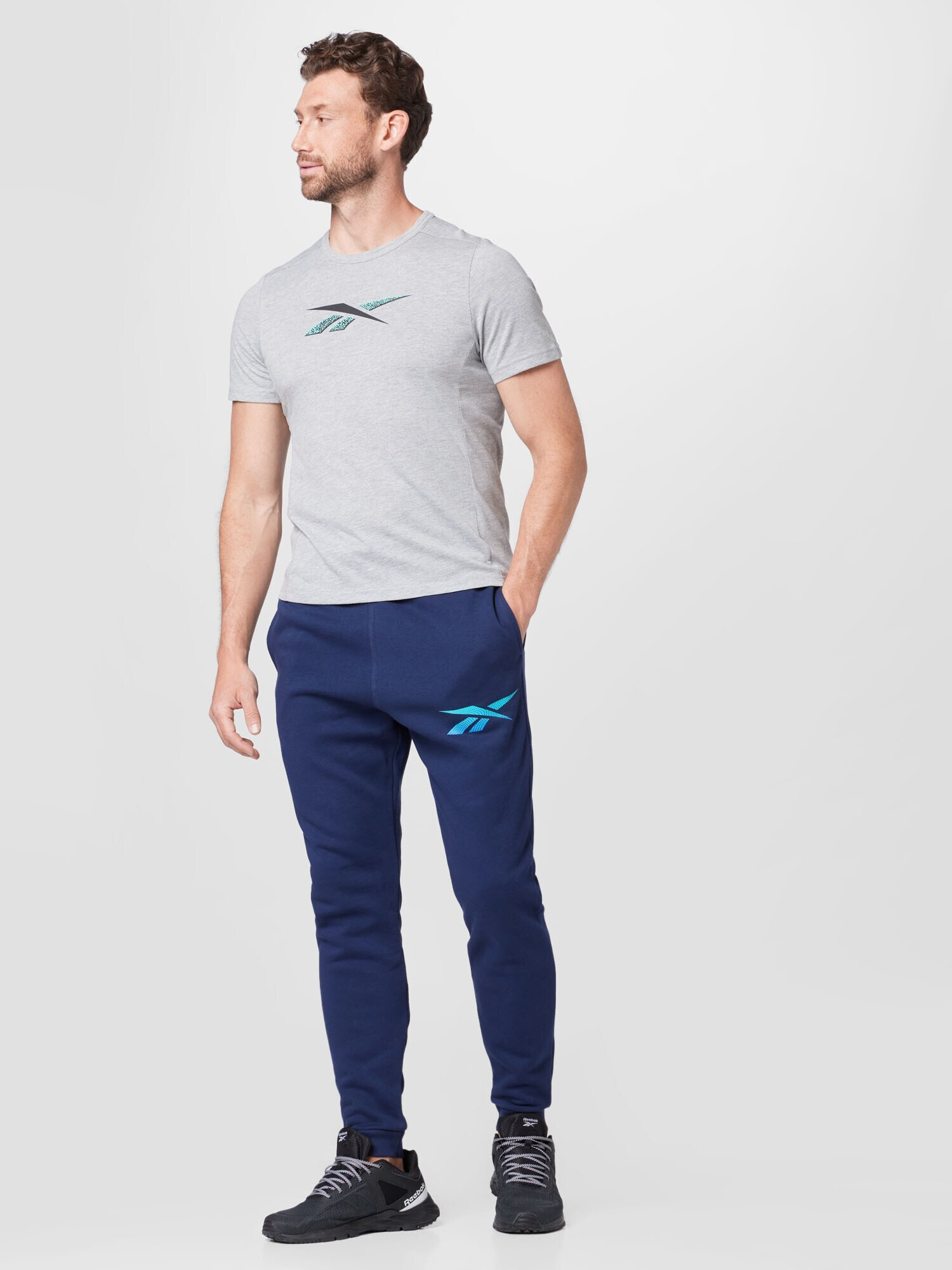 Reebok Sport Pantaloni sport bleumarin / azur - Pled.ro