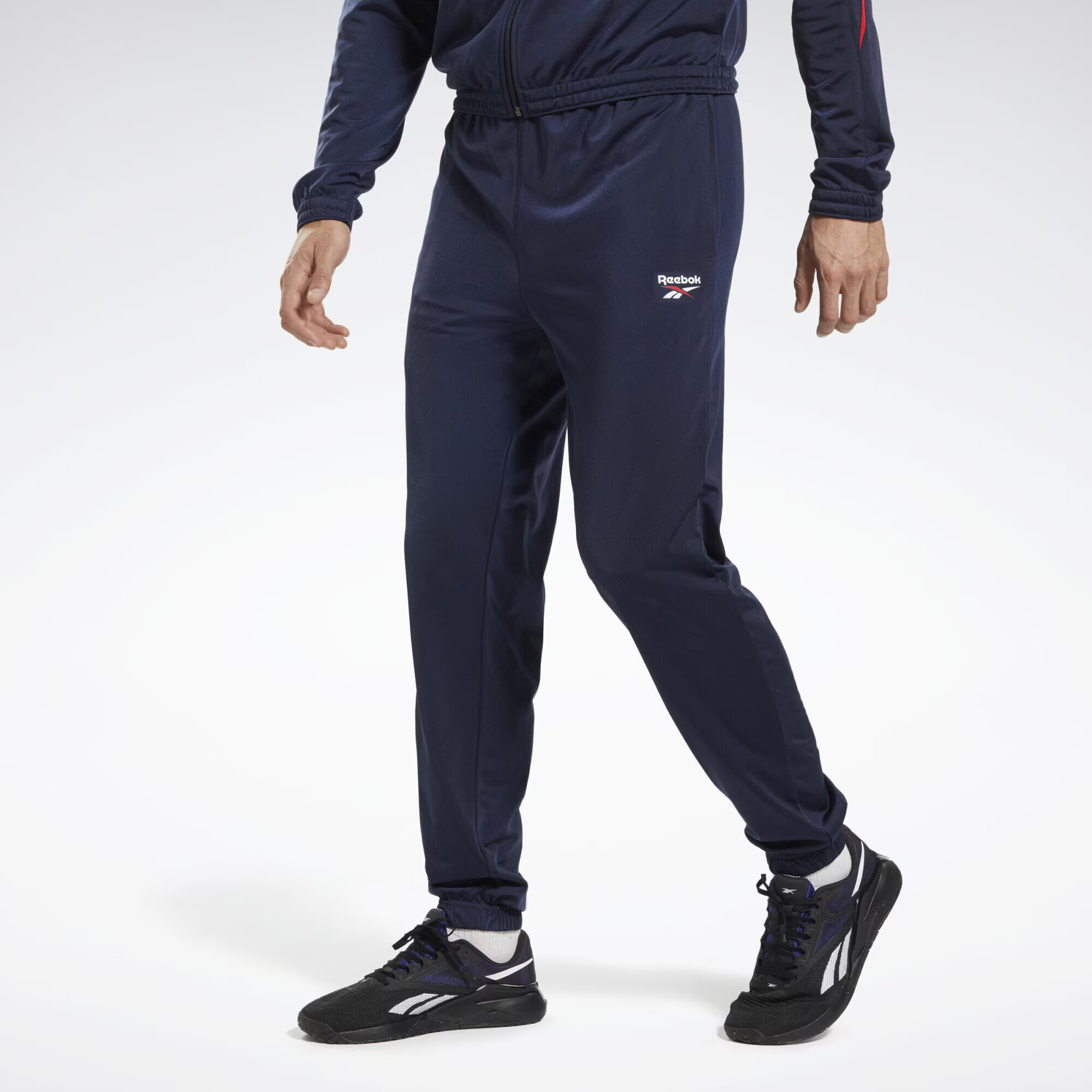 Reebok Pantaloni sport bleumarin / roșu cireș / alb - Pled.ro