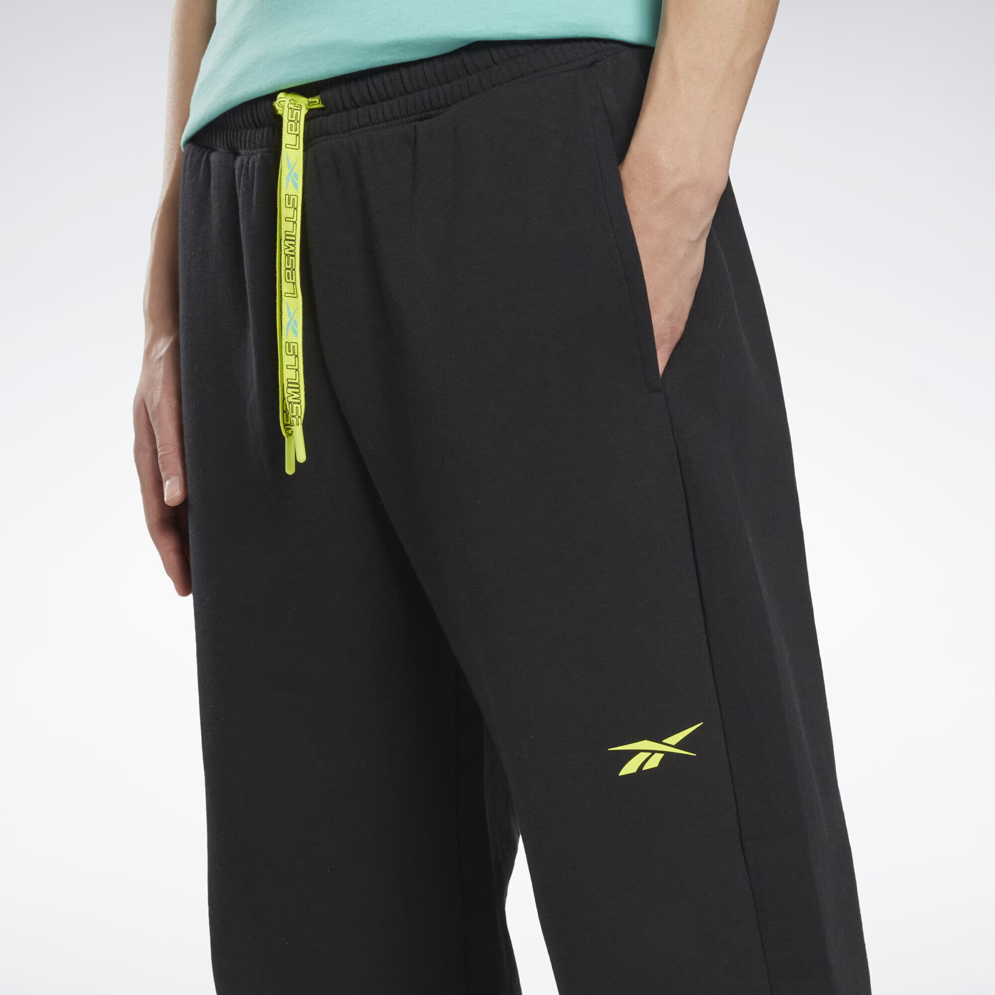 Reebok Pantaloni sport 'Les Mills®' galben / negru - Pled.ro