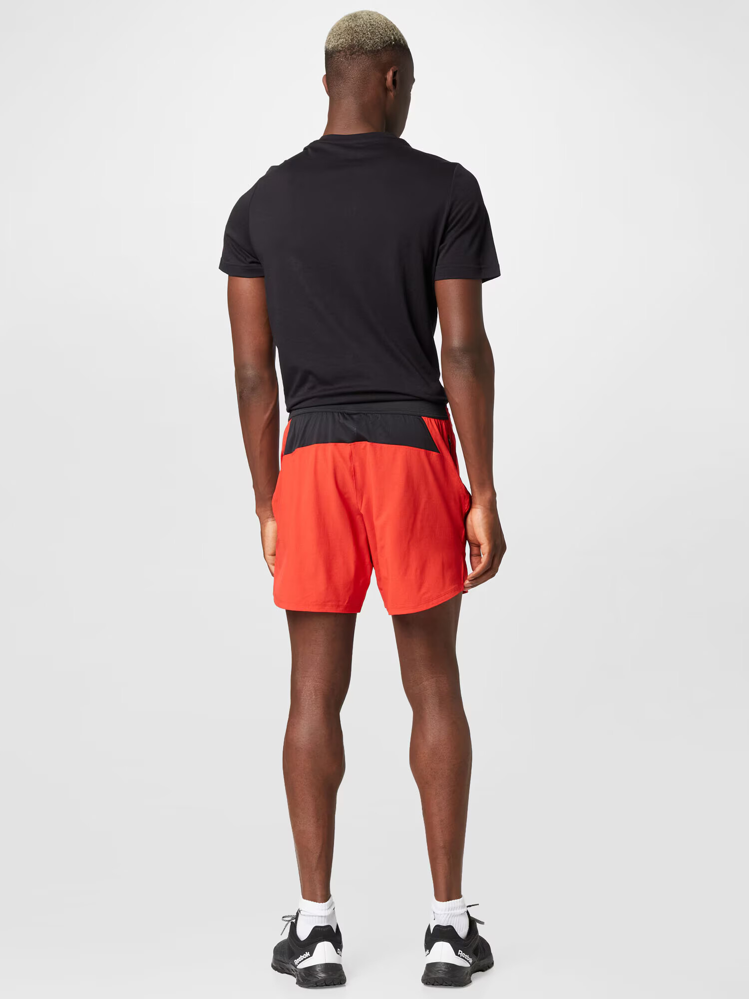 Reebok Sport Pantaloni sport roșu / negru - Pled.ro