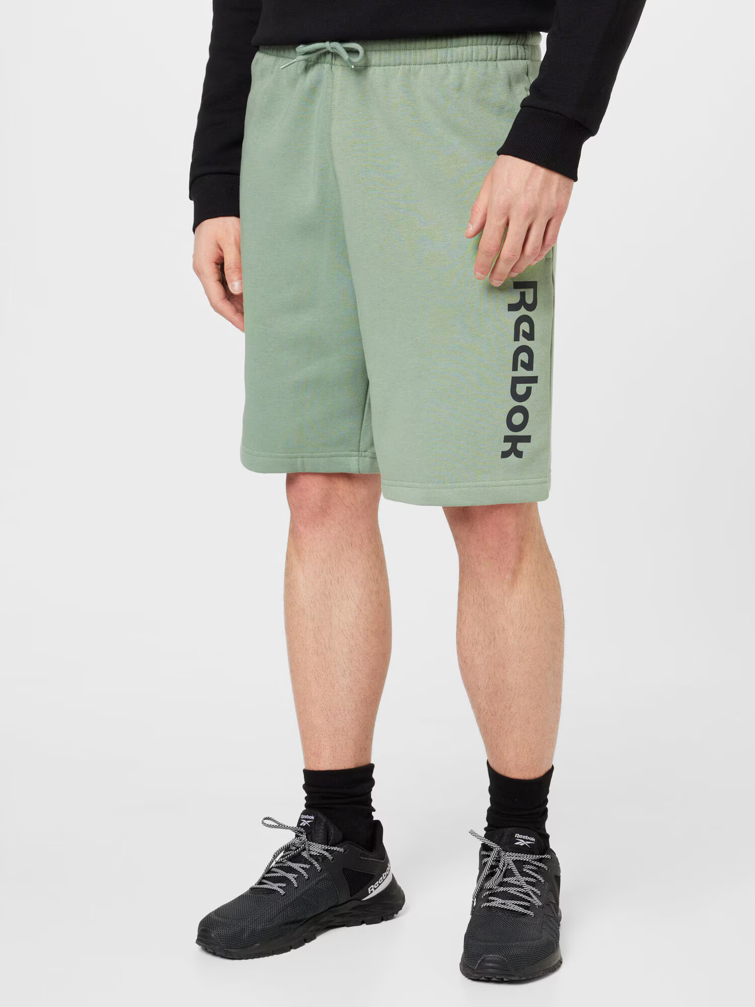 Reebok Sport Pantaloni sport verde deschis / negru - Pled.ro