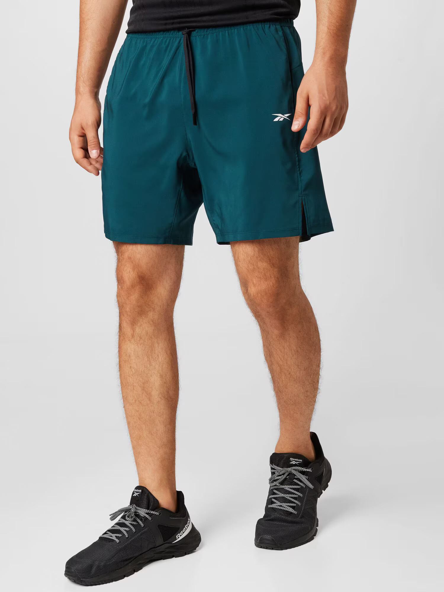 Reebok Sport Pantaloni sport verde petrol / alb - Pled.ro