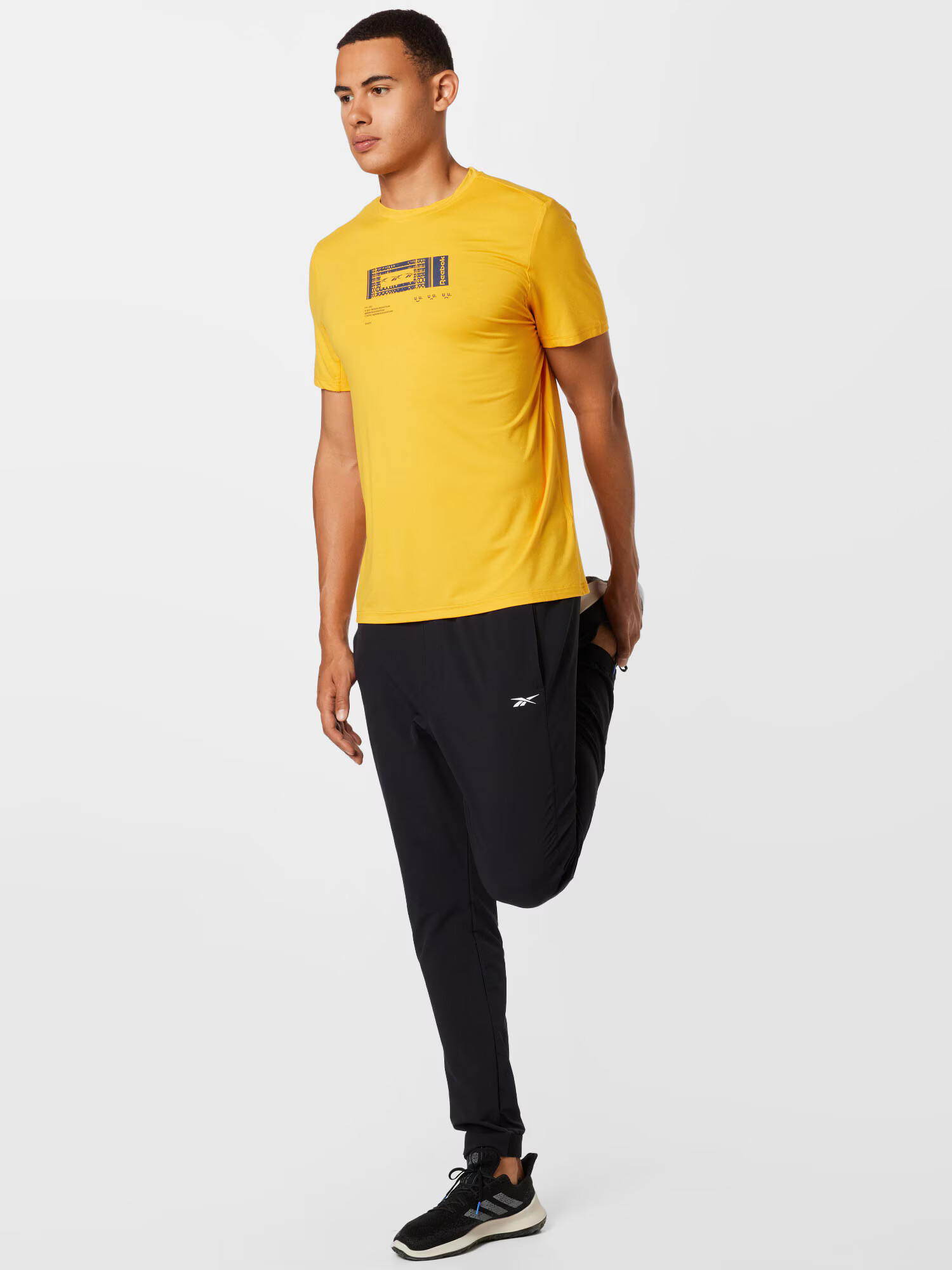 Reebok Tricou funcțional galben / negru - Pled.ro