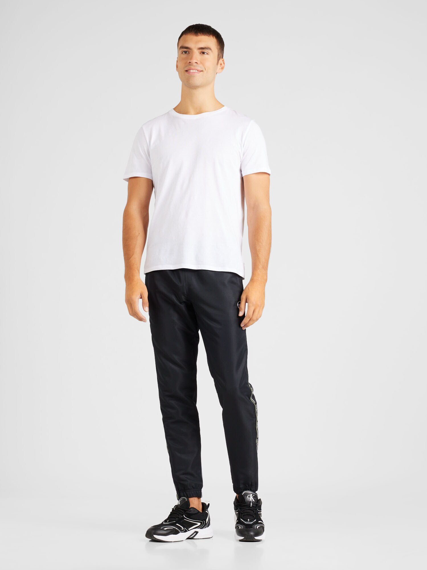 Sergio Tacchini Pantaloni sport 'MIDDAY' negru / alb - Pled.ro