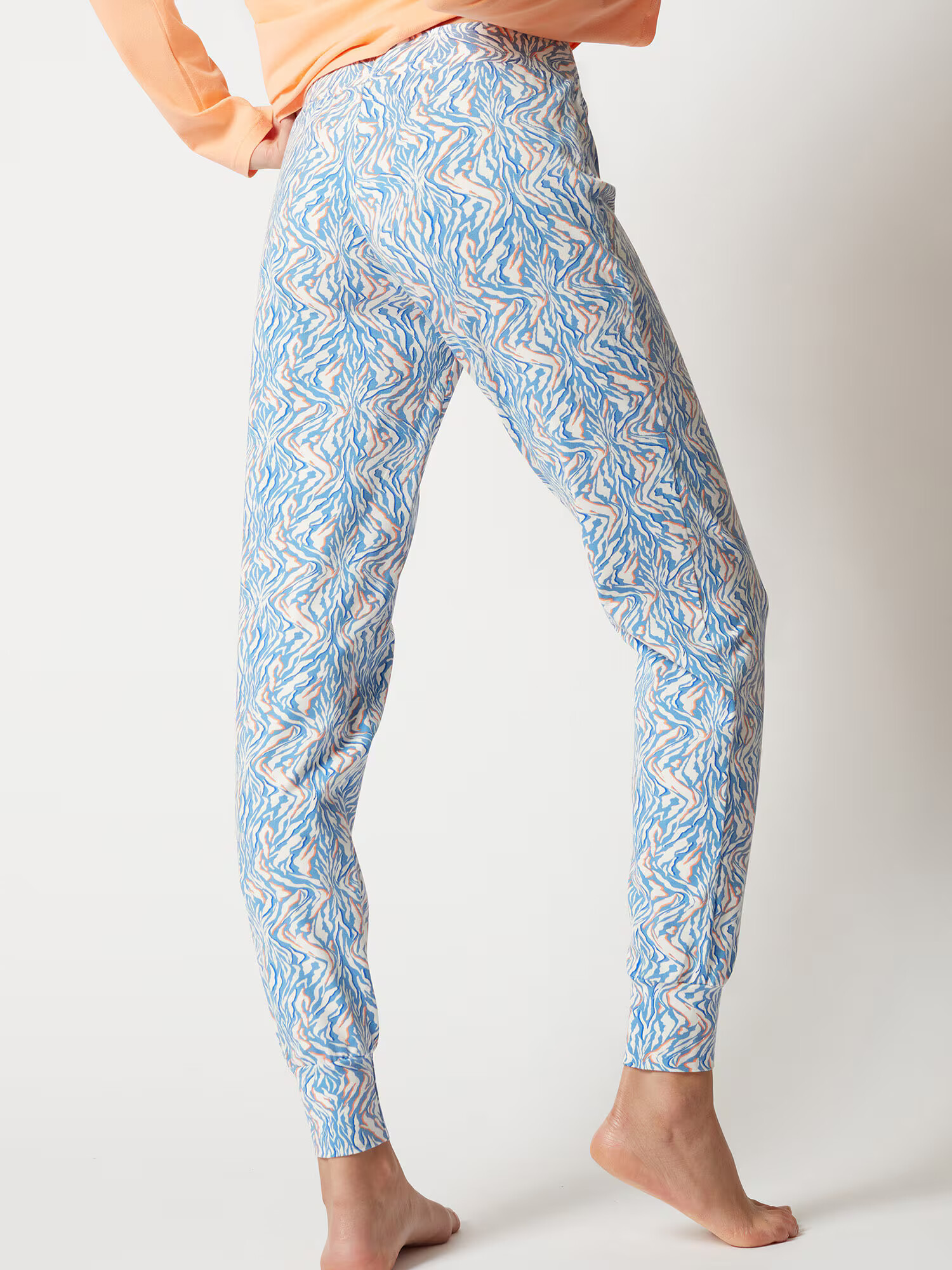 Skiny Pantaloni de pijama albastru deschis / portocaliu somon / alb murdar - Pled.ro