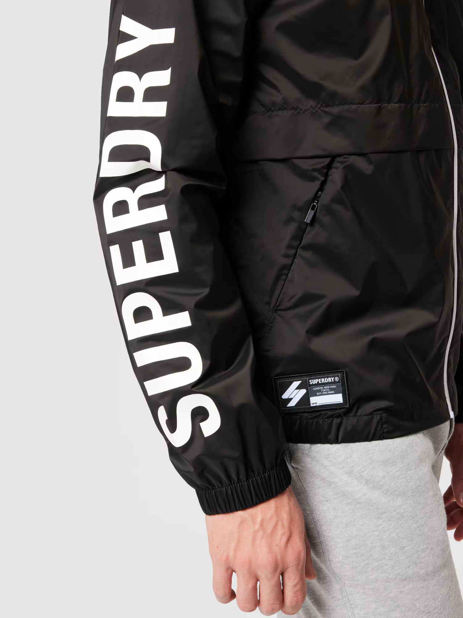 Superdry Geacă de primăvară-toamnă negru / alb - Pled.ro