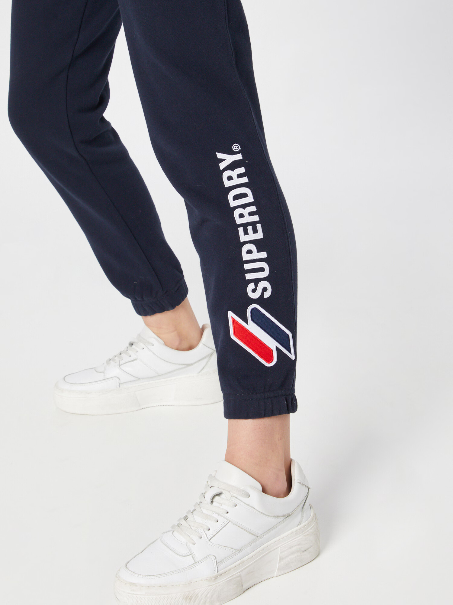 Superdry Pantaloni albastru închis / roșu / alb - Pled.ro