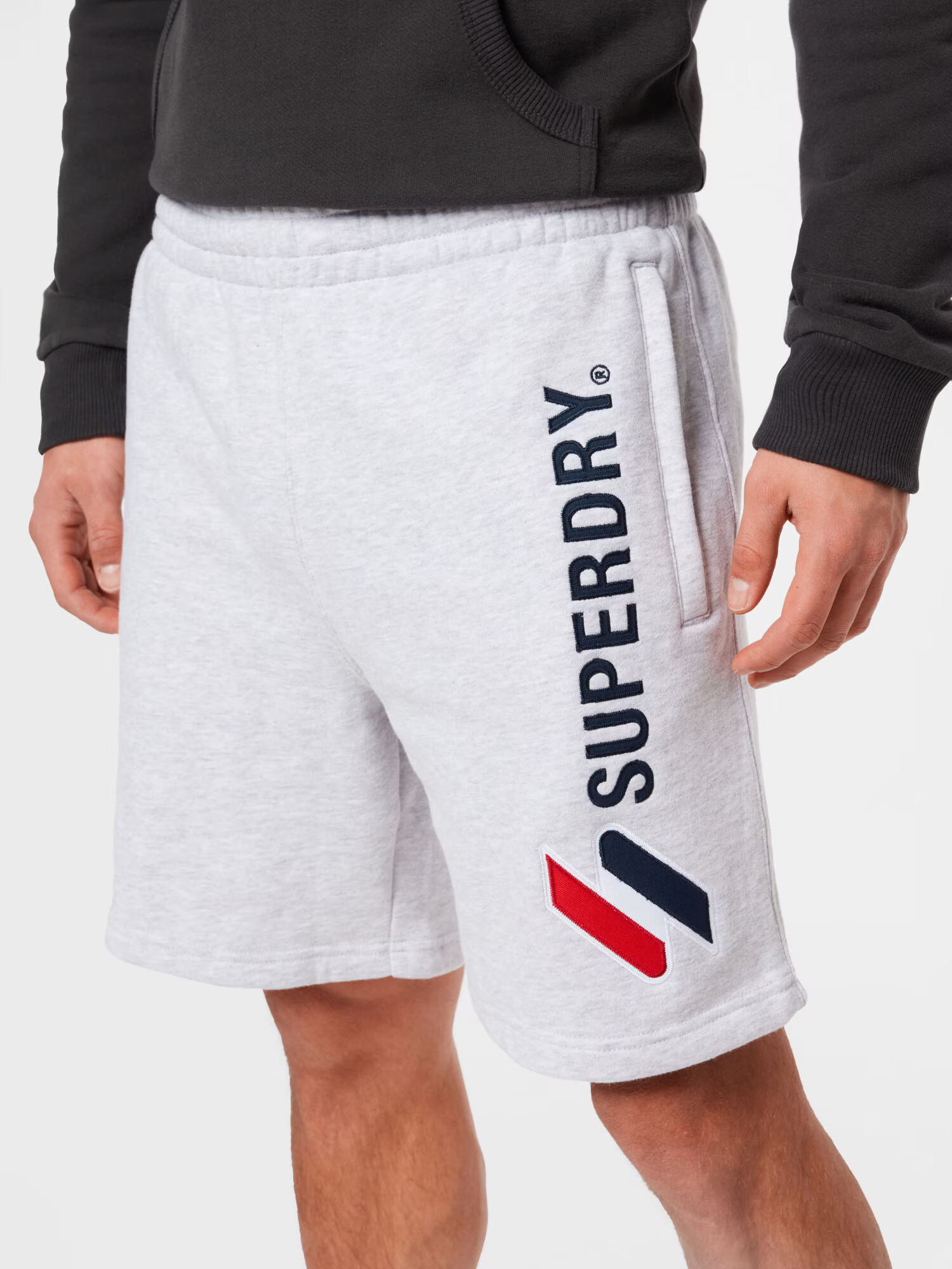 Superdry Pantaloni bleumarin / gri deschis / roșu - Pled.ro