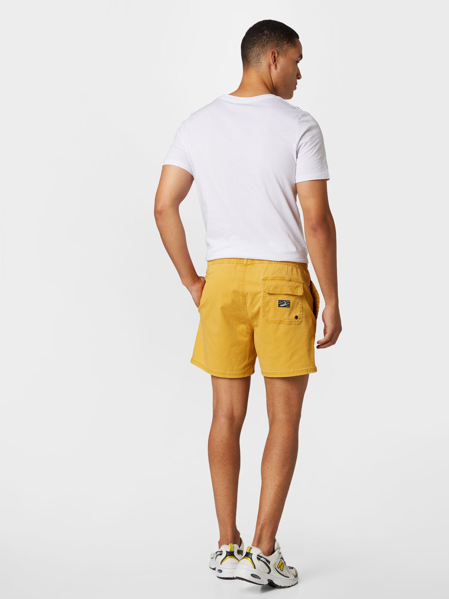 Superdry Pantaloni galben - Pled.ro