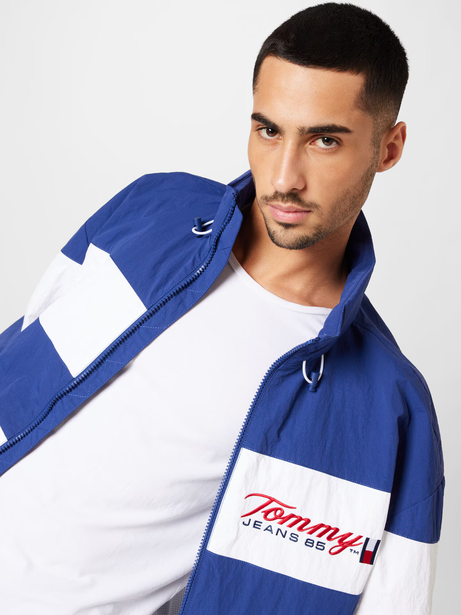 Tommy Jeans Geacă de primăvară-toamnă albastru / roșu intens / alb - Pled.ro