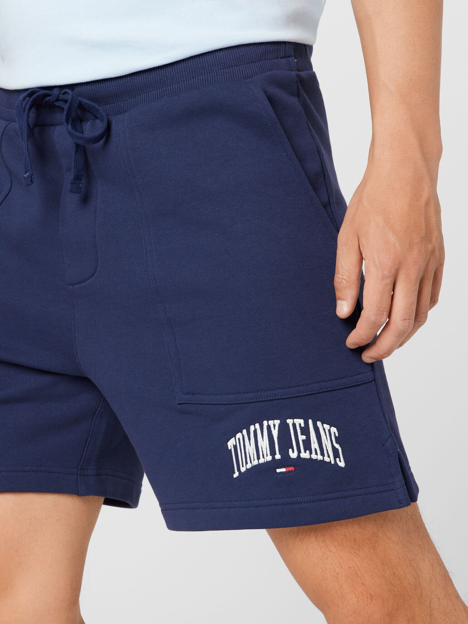 Tommy Jeans Pantaloni bleumarin / alb - Pled.ro