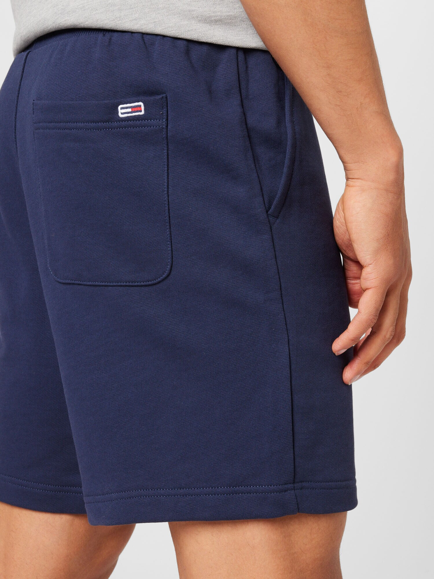 Tommy Jeans Pantaloni bleumarin / alb - Pled.ro