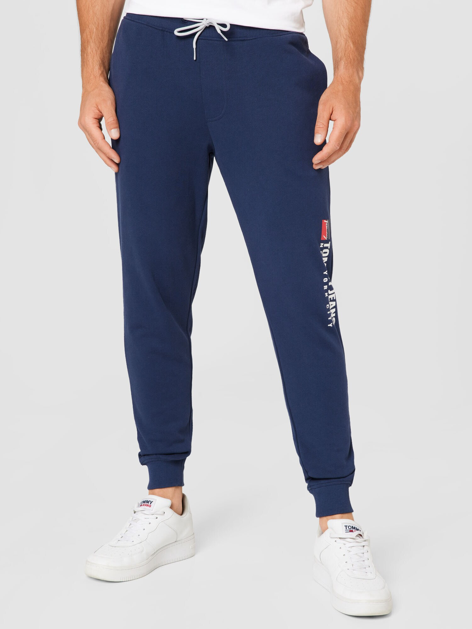 Tommy Jeans Pantaloni bleumarin / roșu / alb - Pled.ro