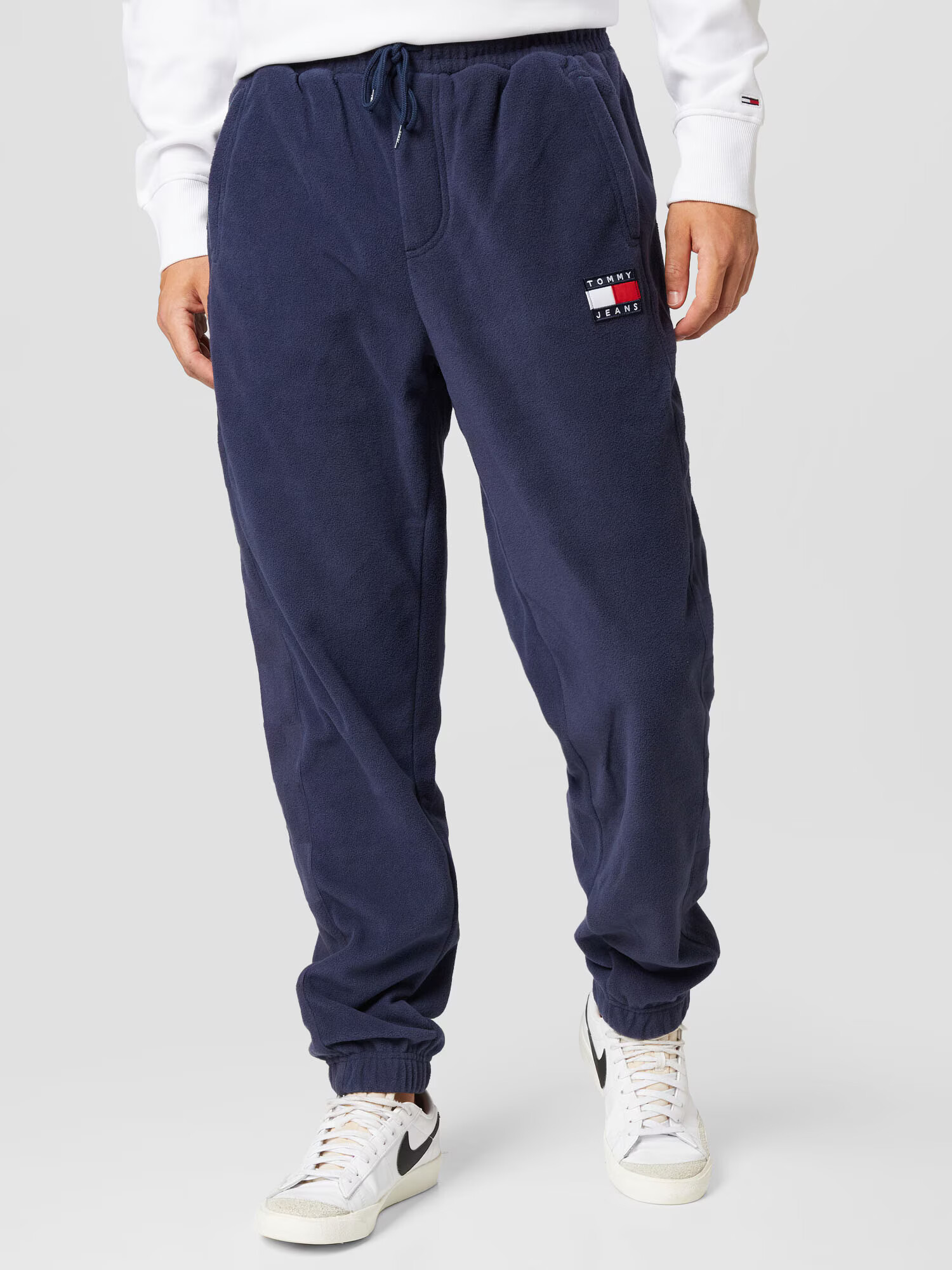 Tommy Jeans Pantaloni bleumarin / roșu / alb - Pled.ro