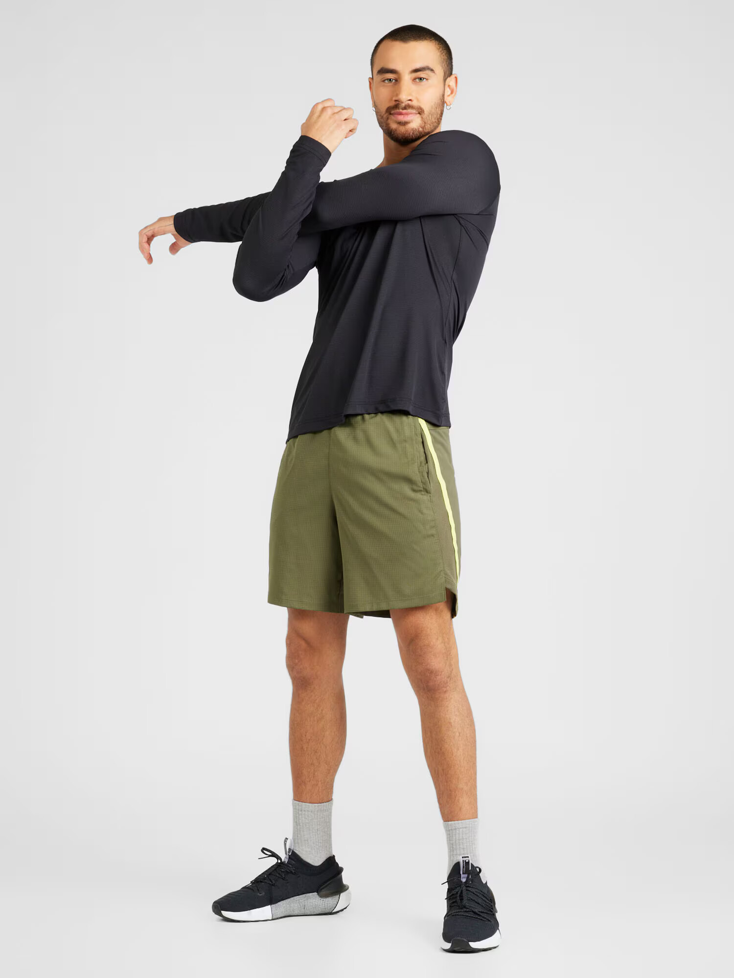 UNDER ARMOUR Pantaloni sport 'Launch 7' galben citron / oliv - Pled.ro