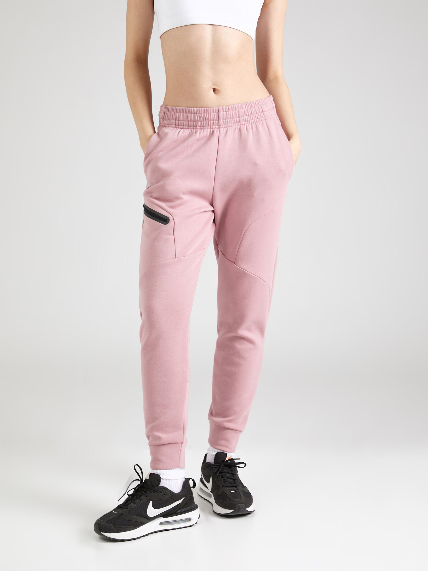 UNDER ARMOUR Pantaloni sport 'Unstoppable' roz deschis / negru - Pled.ro