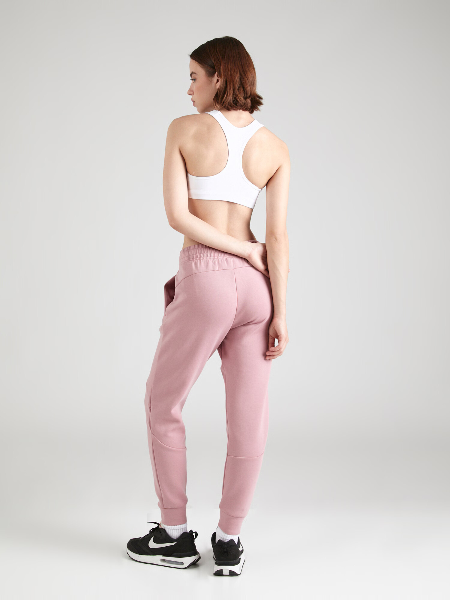 UNDER ARMOUR Pantaloni sport 'Unstoppable' roz deschis / negru - Pled.ro