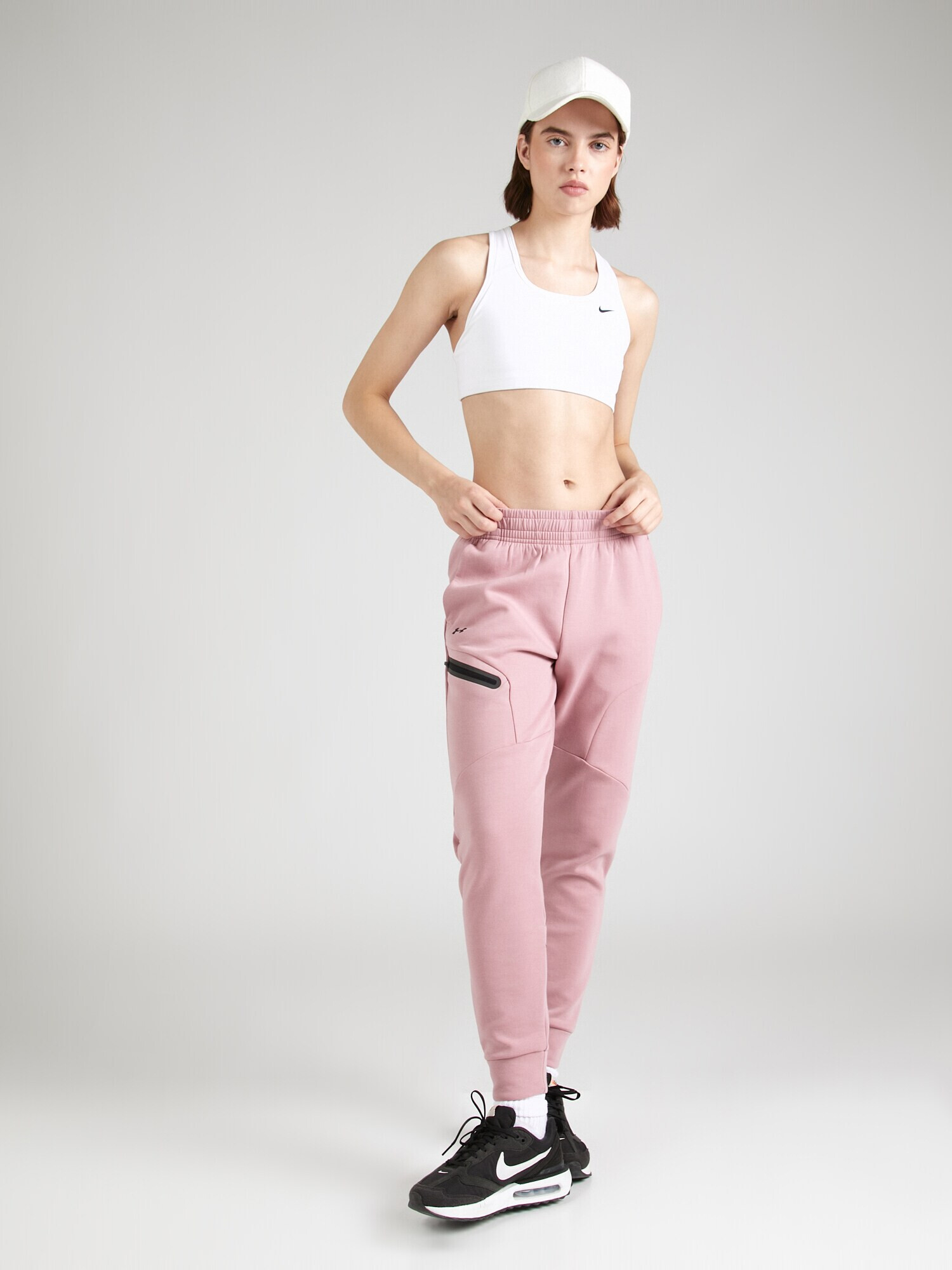 UNDER ARMOUR Pantaloni sport 'Unstoppable' roz deschis / negru - Pled.ro