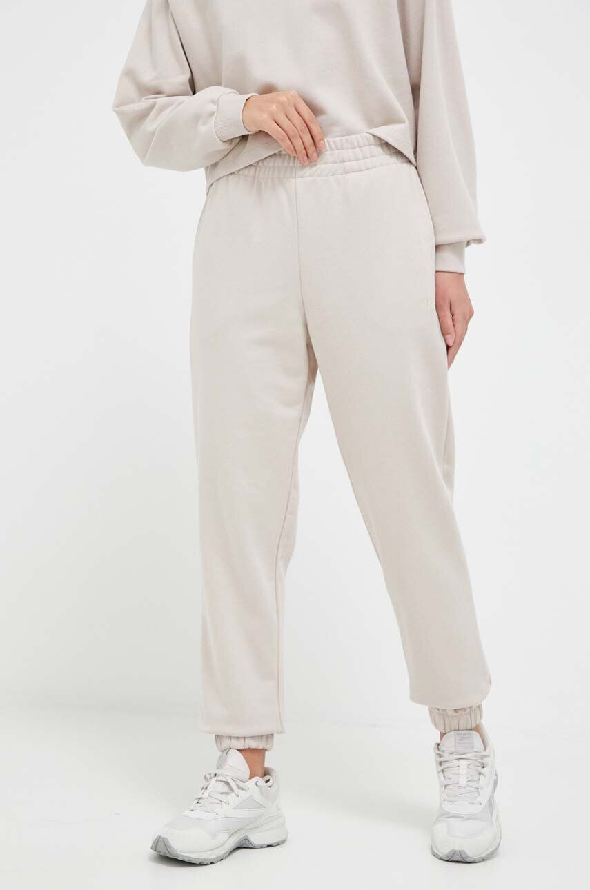 4F pantaloni de trening culoarea bej neted - Pled.ro