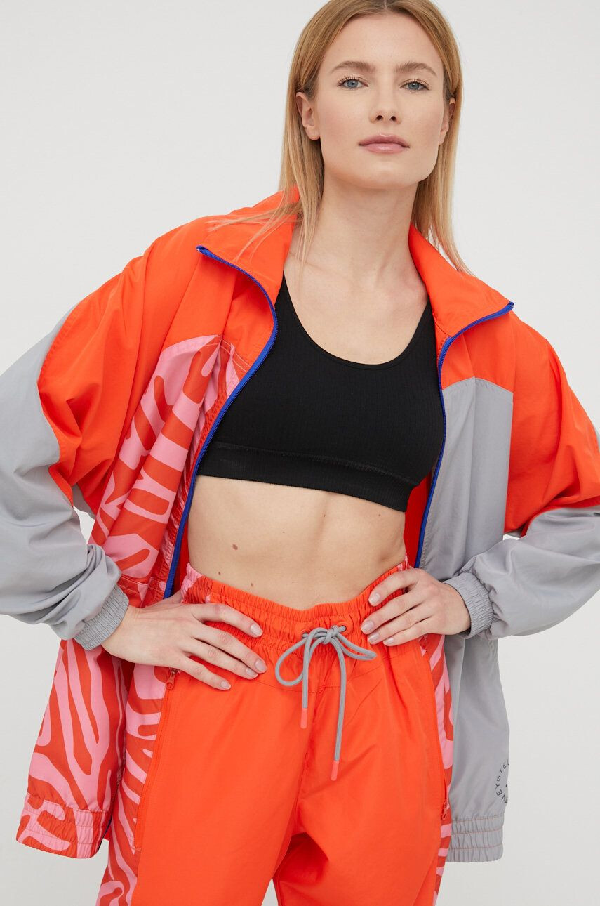 adidas by Stella McCartney geaca sport H59949 culoarea portocaliu de tranzitie oversize - Pled.ro