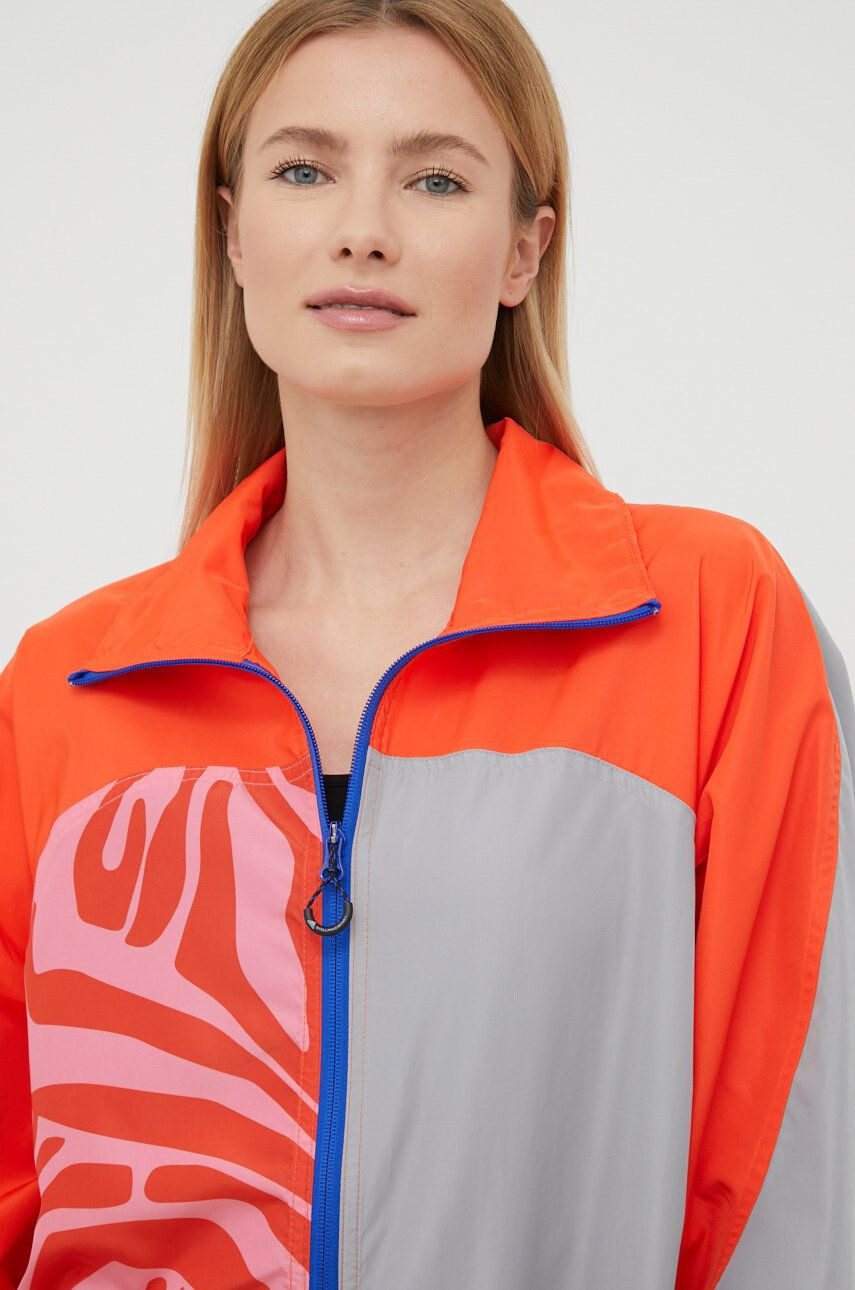 adidas by Stella McCartney geaca sport H59949 culoarea portocaliu de tranzitie oversize - Pled.ro