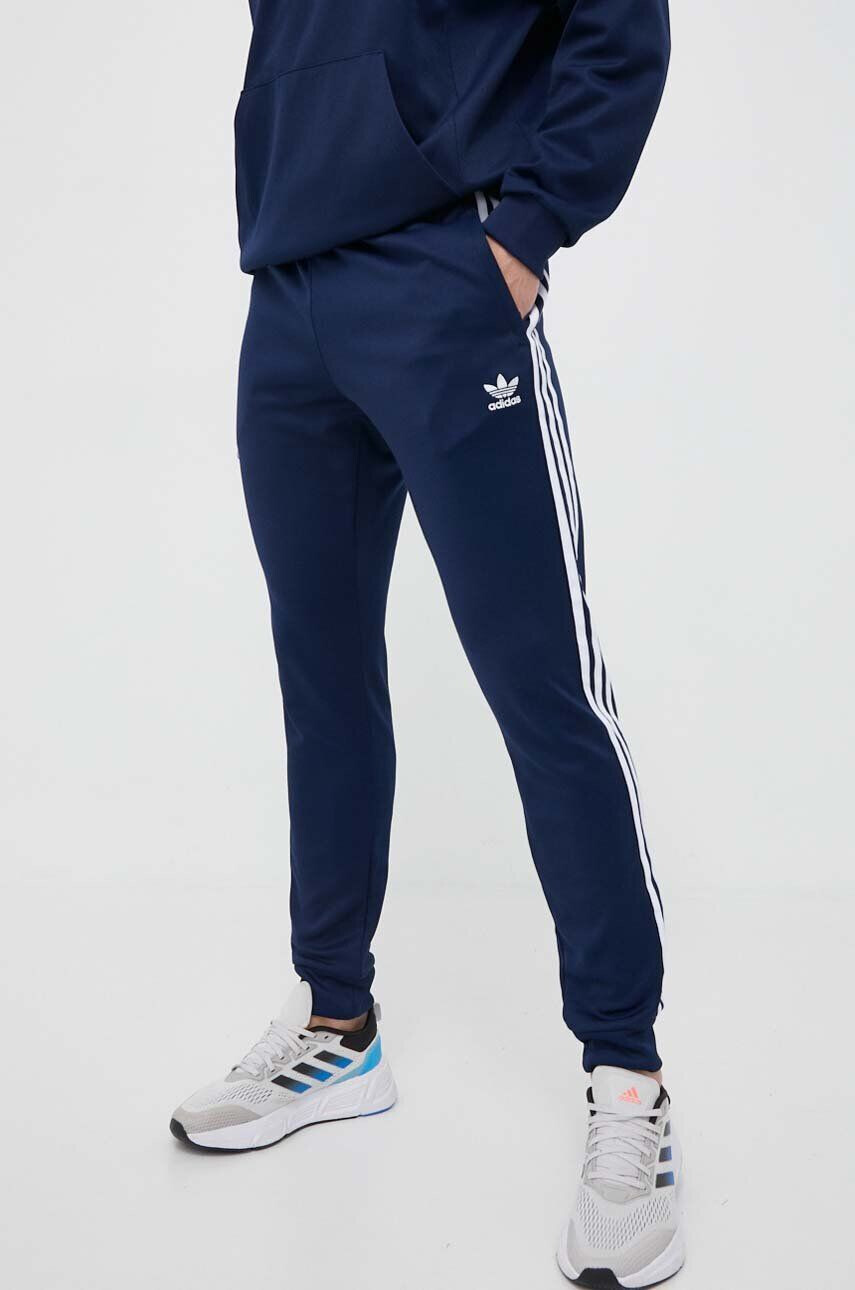 adidas Originals pantaloni de trening culoarea albastru marin neted - Pled.ro