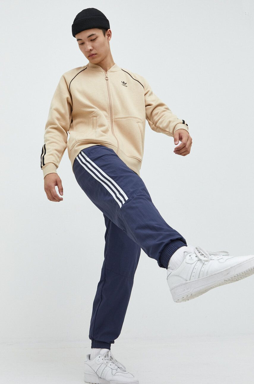 adidas Originals pantaloni de trening Adicolor barbati culoarea albastru marin cu imprimeu - Pled.ro