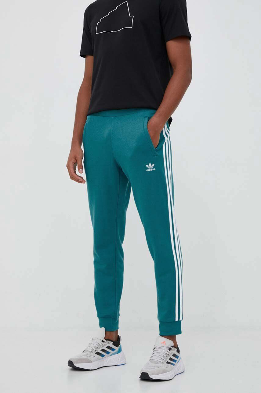 adidas Originals pantaloni de trening IM2110-ARCFUS culoarea turcoaz cu imprimeu - Pled.ro