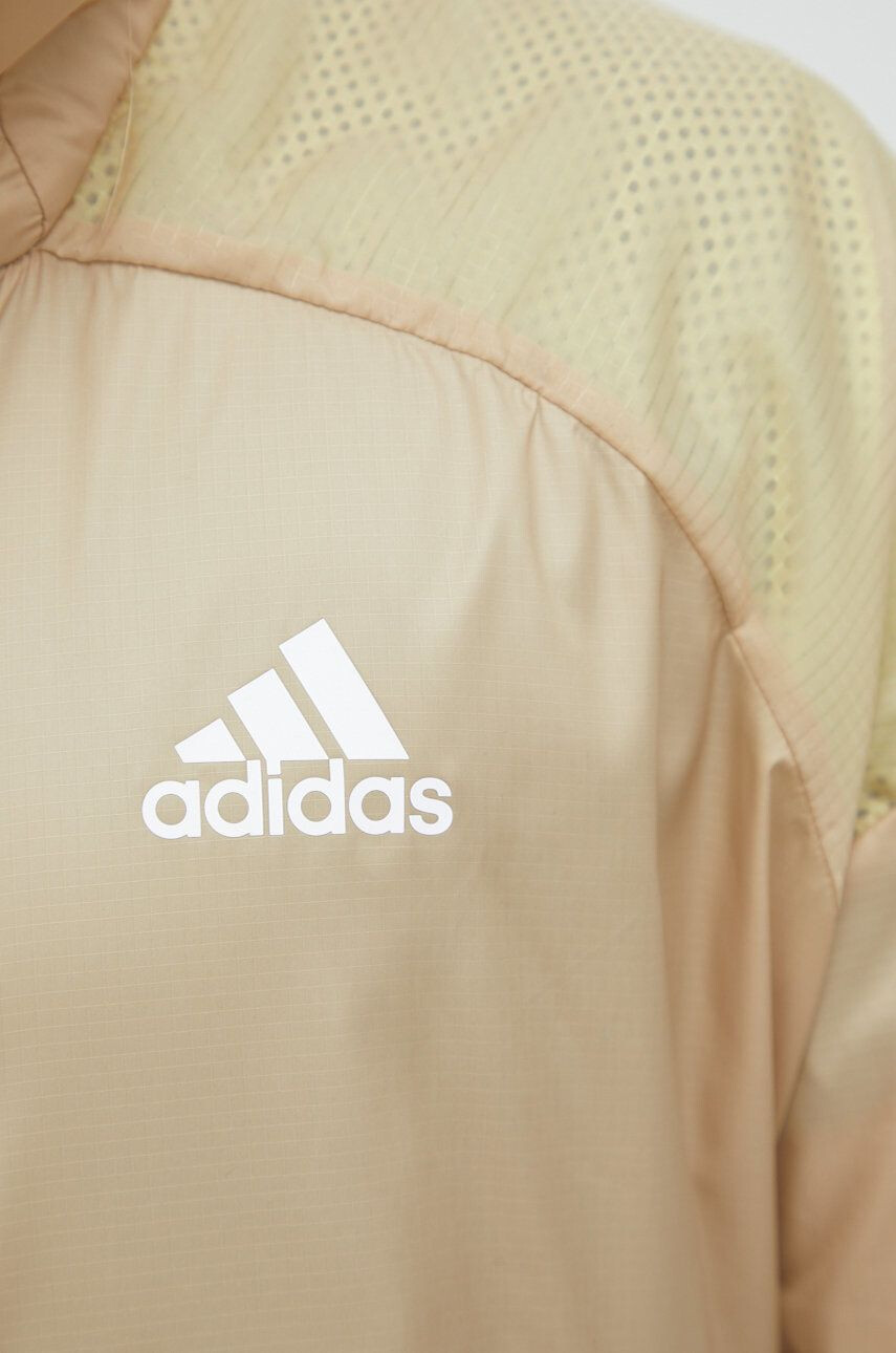 adidas Performance windbreaker culoarea bej de tranzitie - Pled.ro