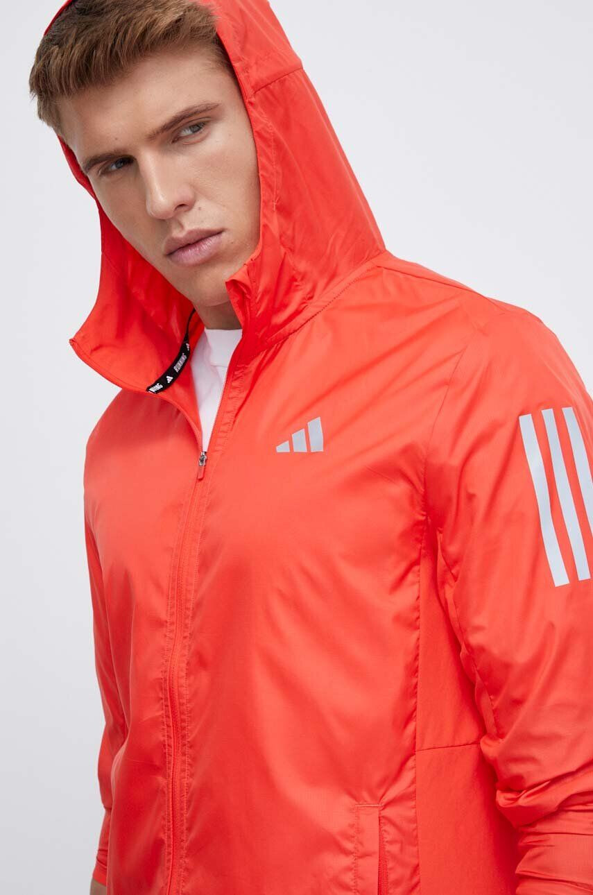 adidas Performance windbreaker Own The Run culoarea rosu de tranzitie - Pled.ro