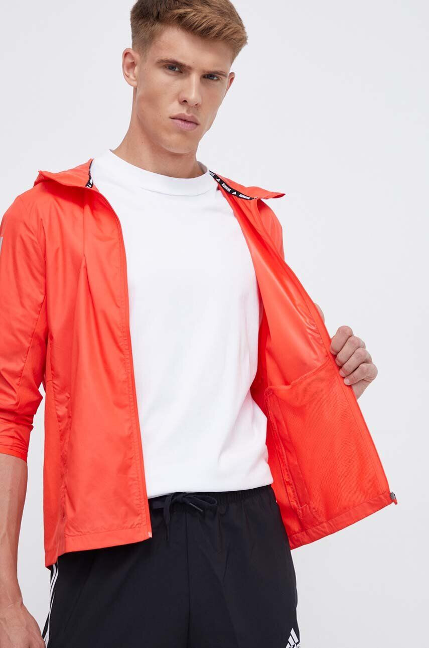 adidas Performance windbreaker Own The Run culoarea rosu de tranzitie - Pled.ro