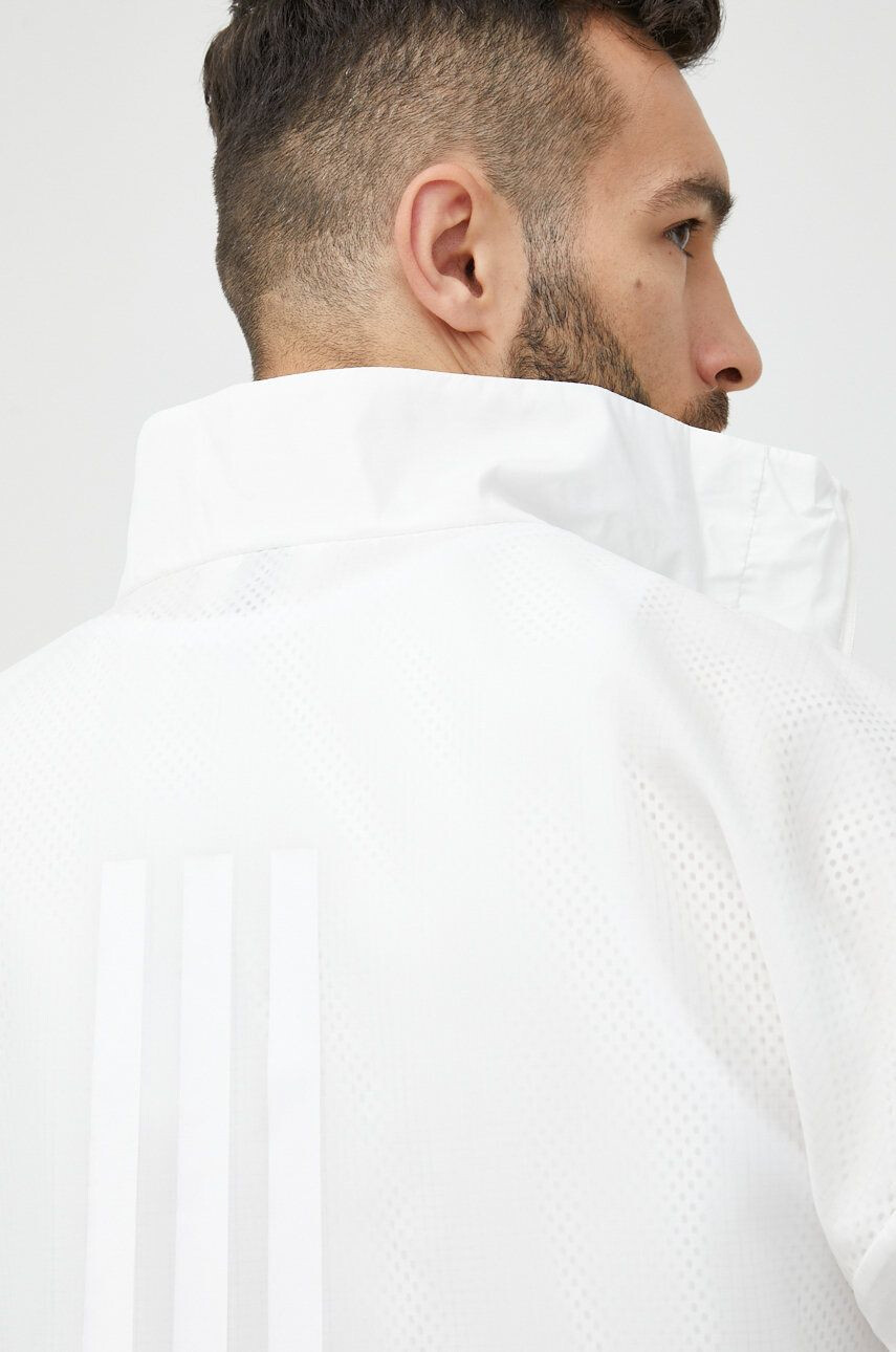 adidas Performance windbreaker Traveer culoarea alb de tranzitie oversize - Pled.ro