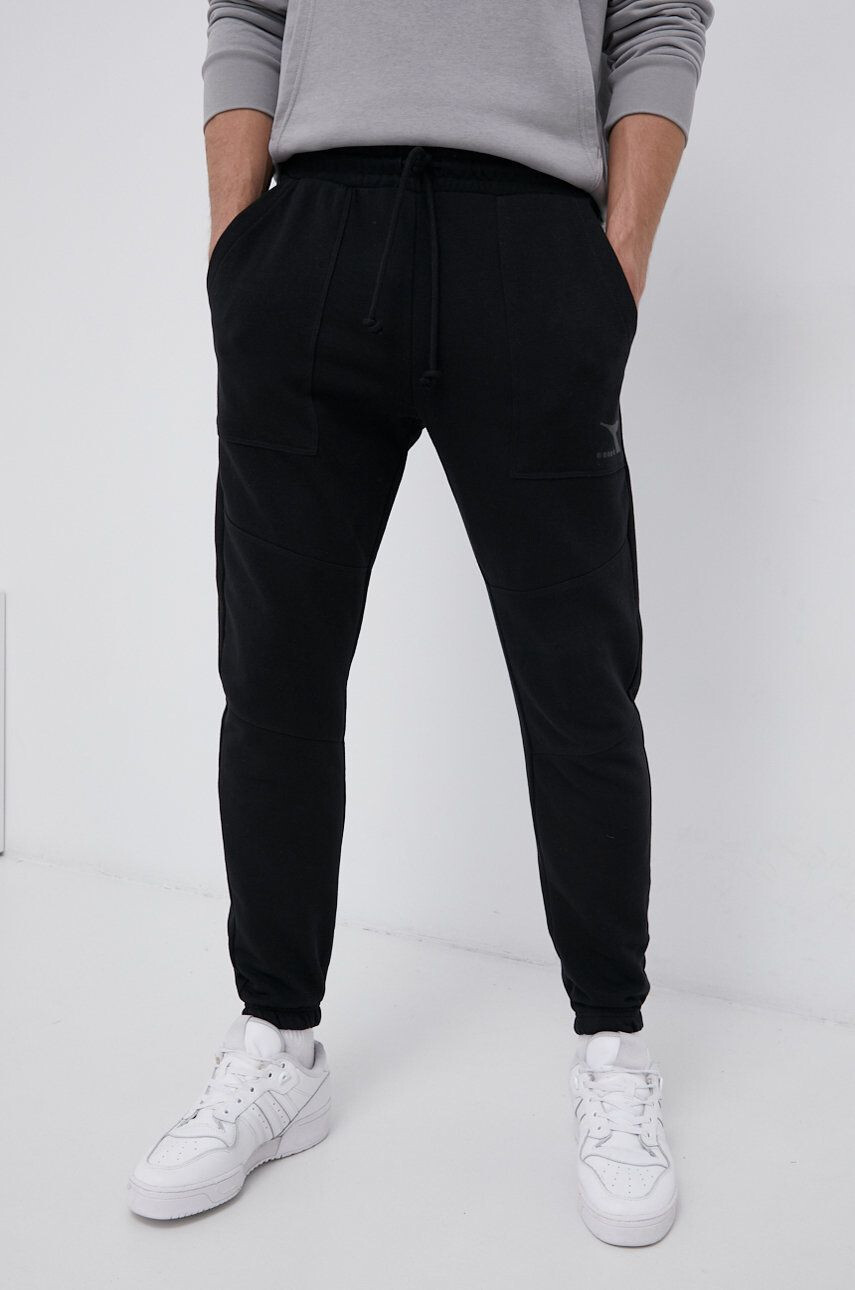 Diadora Pantaloni bărbați culoarea negru material neted - Pled.ro