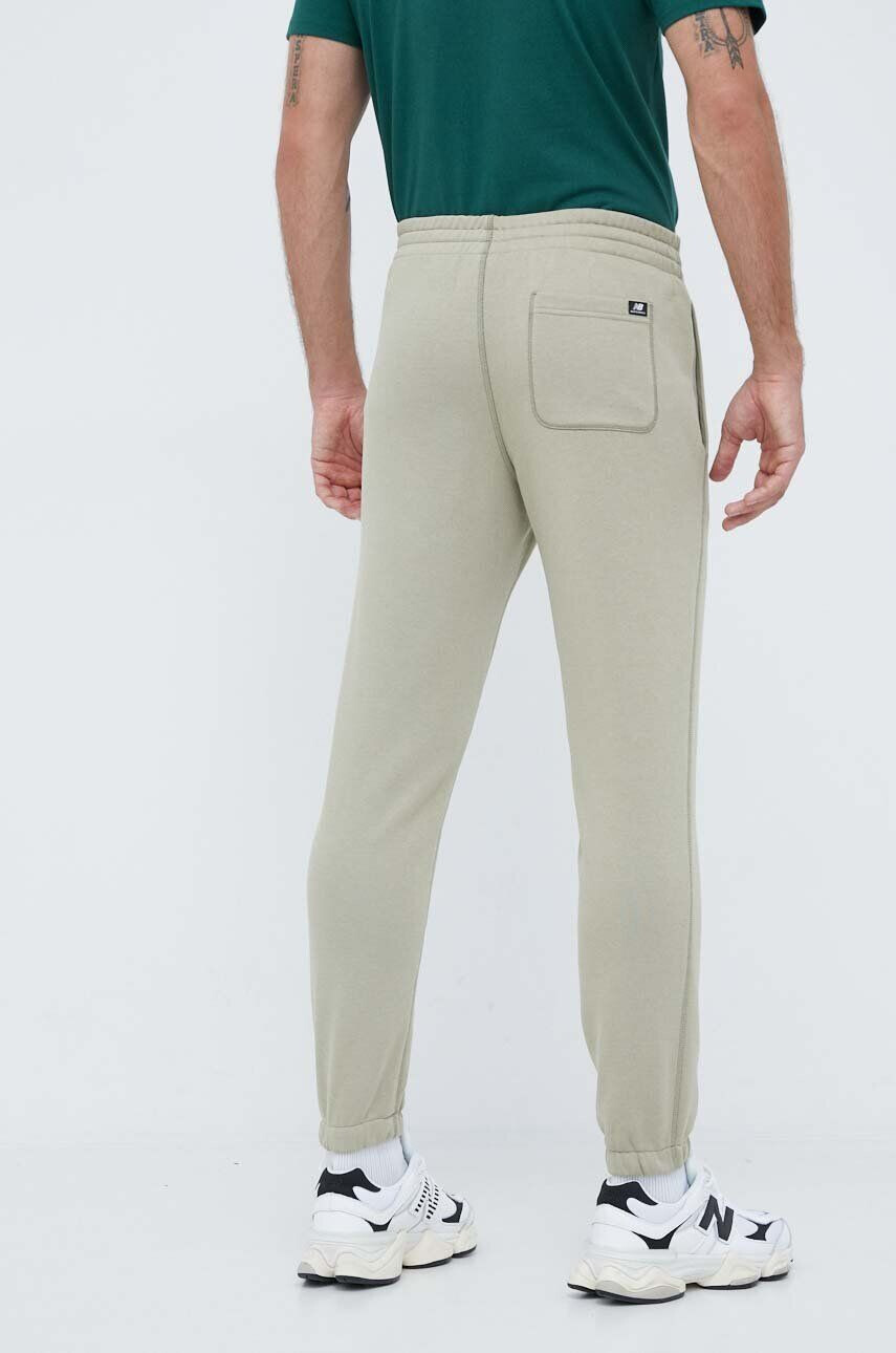 New Balance pantaloni de trening culoarea verde neted - Pled.ro