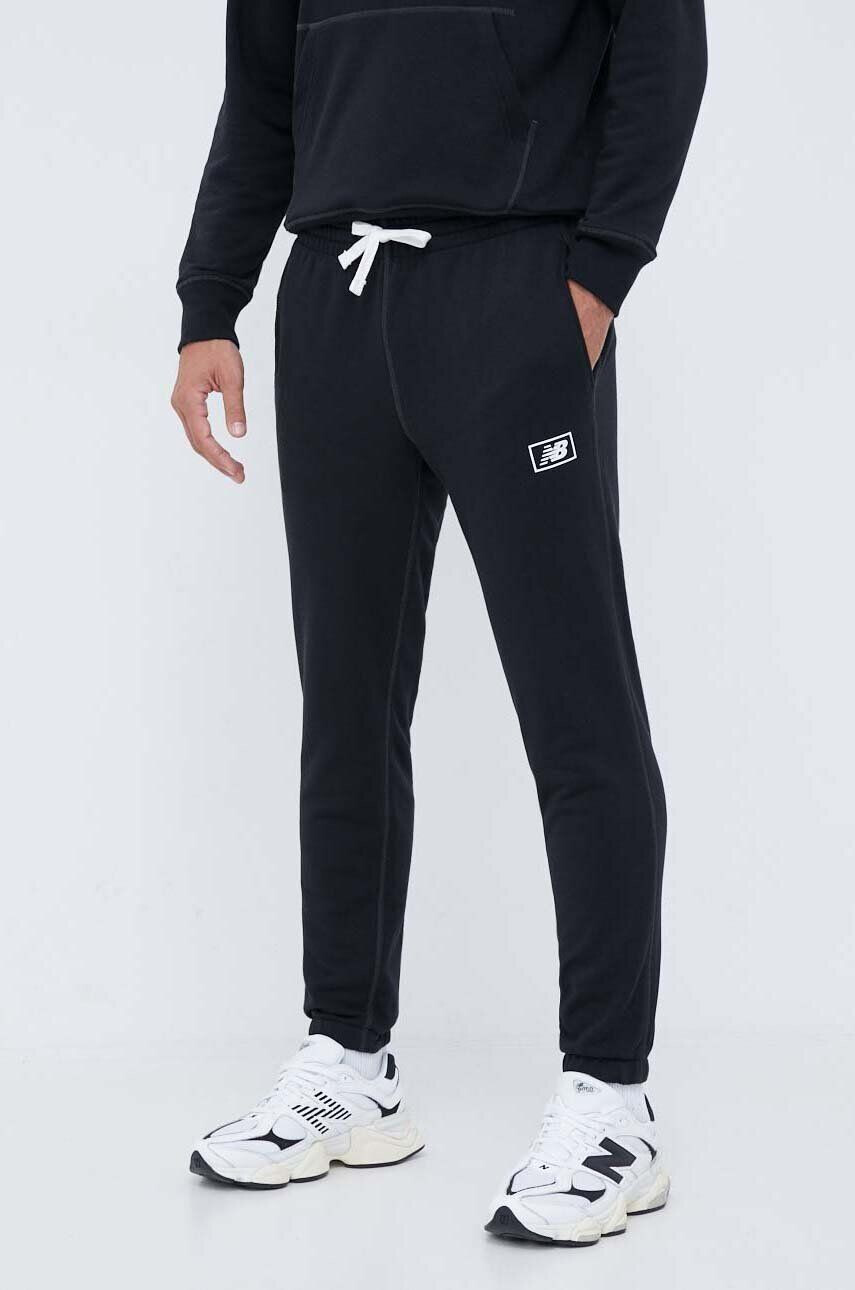 New Balance pantaloni de trening culoarea negru neted - Pled.ro