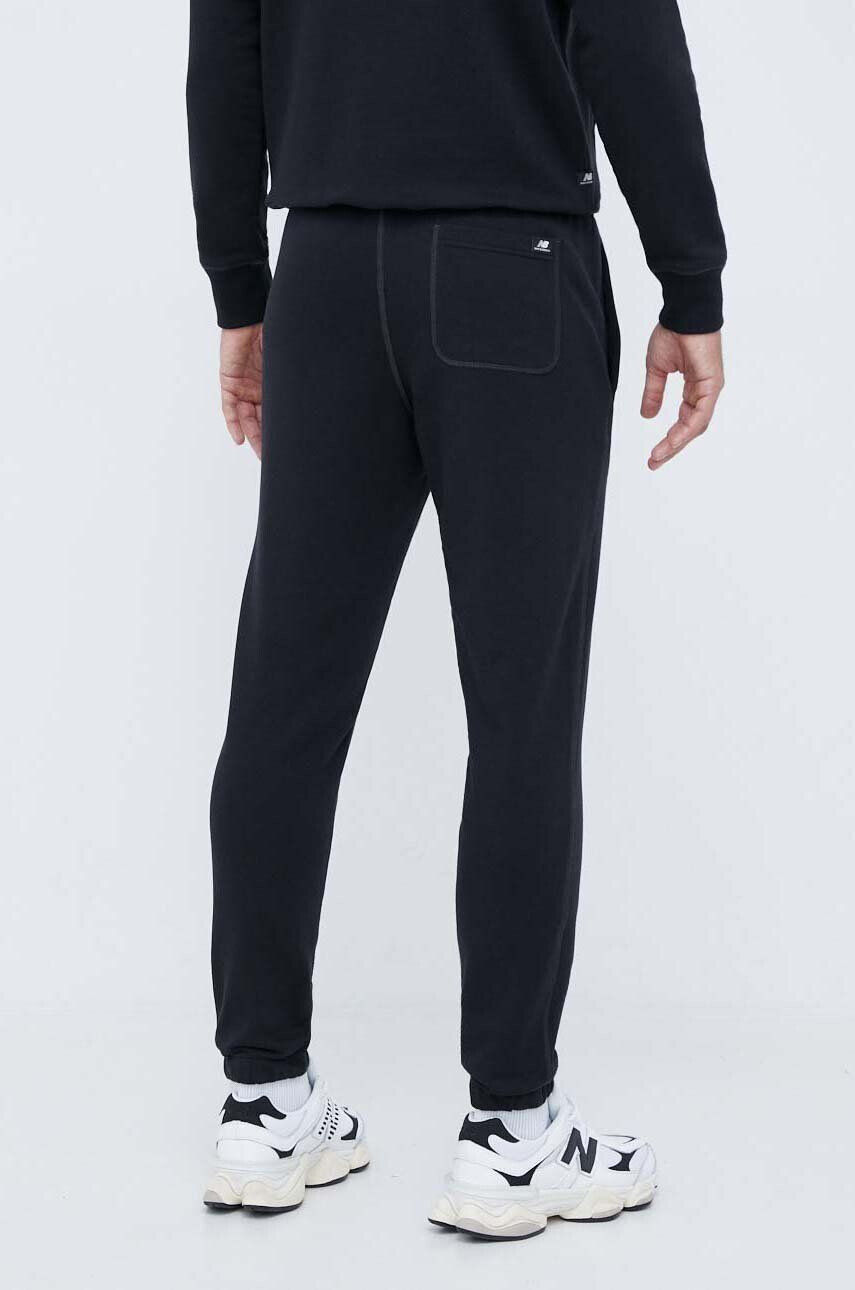 New Balance pantaloni de trening culoarea negru neted - Pled.ro