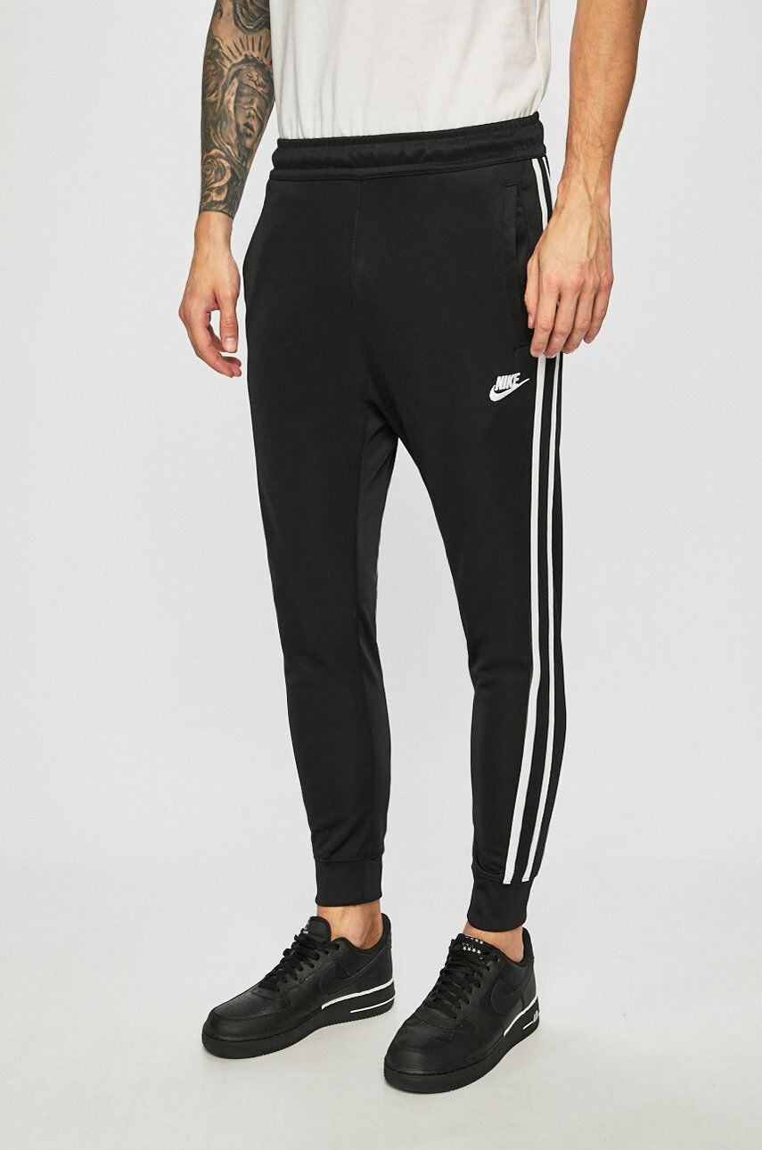 Nike Pantaloni - Pled.ro