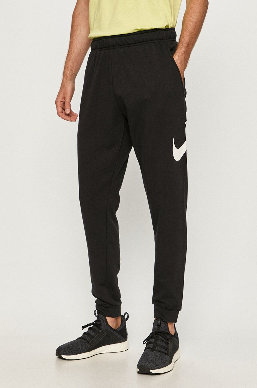 Nike Pantaloni - Pled.ro