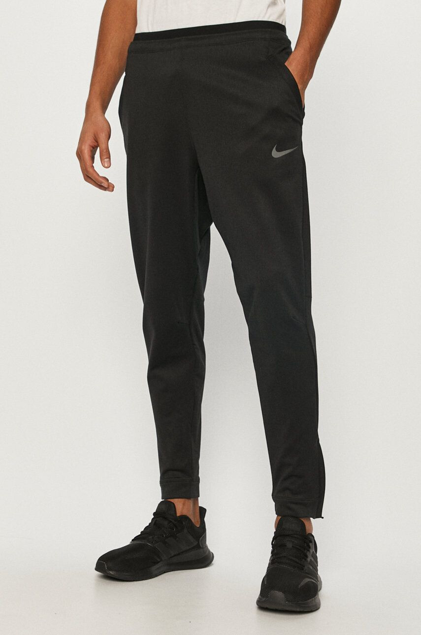 Nike Pantaloni - Pled.ro