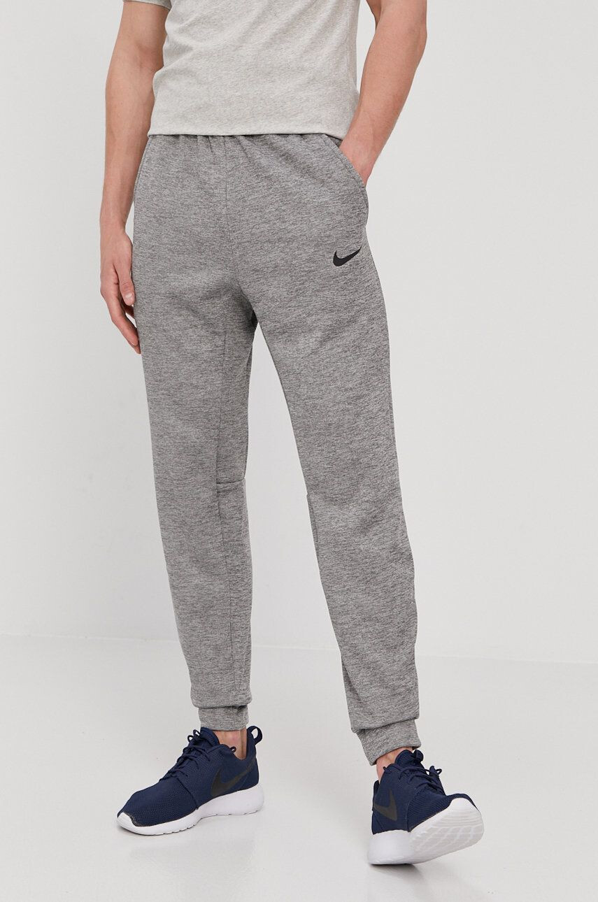 Nike Pantaloni - Pled.ro