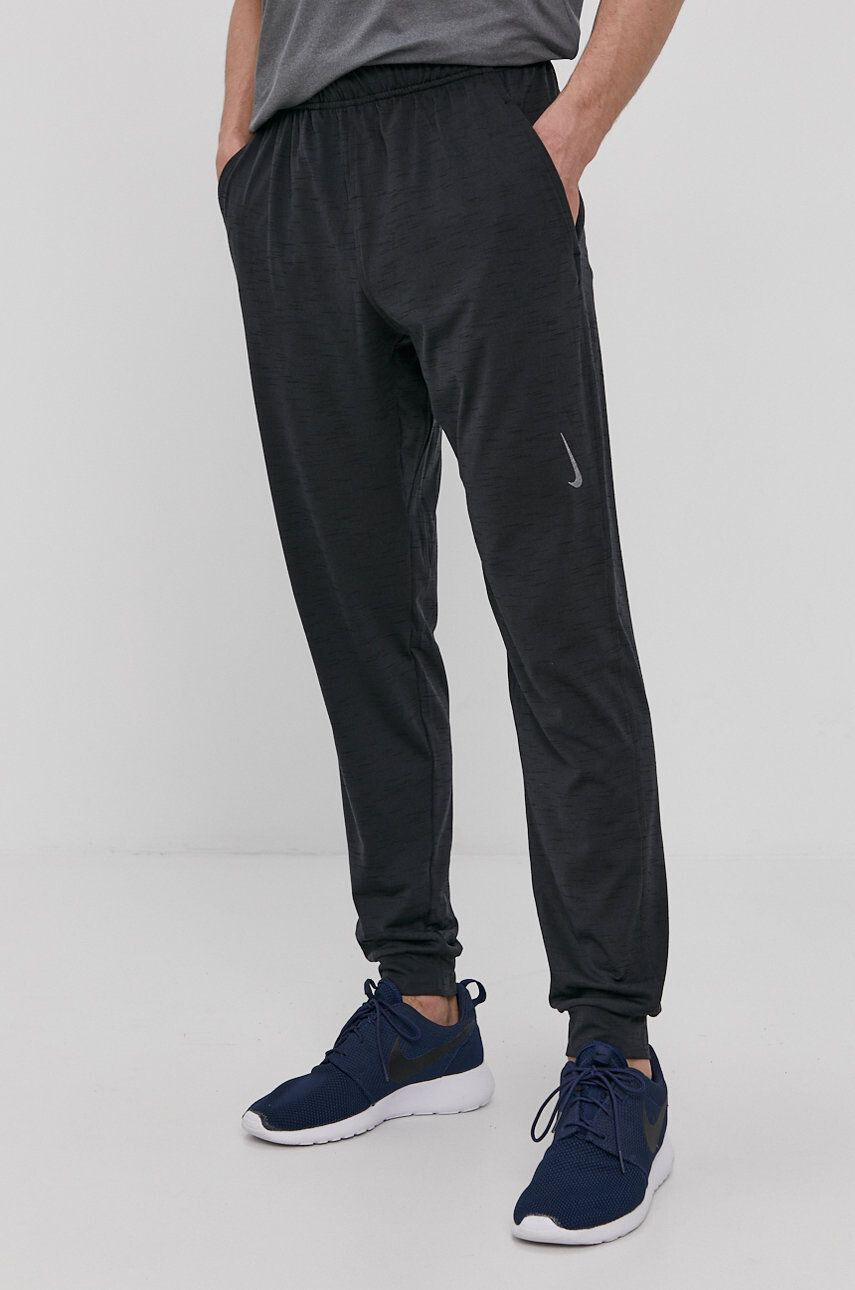 Nike Pantaloni - Pled.ro