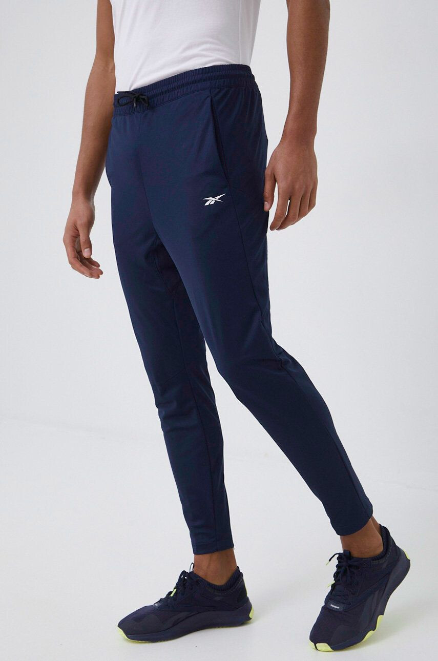 Reebok pantaloni de trening barbati culoarea albastru marin neted - Pled.ro