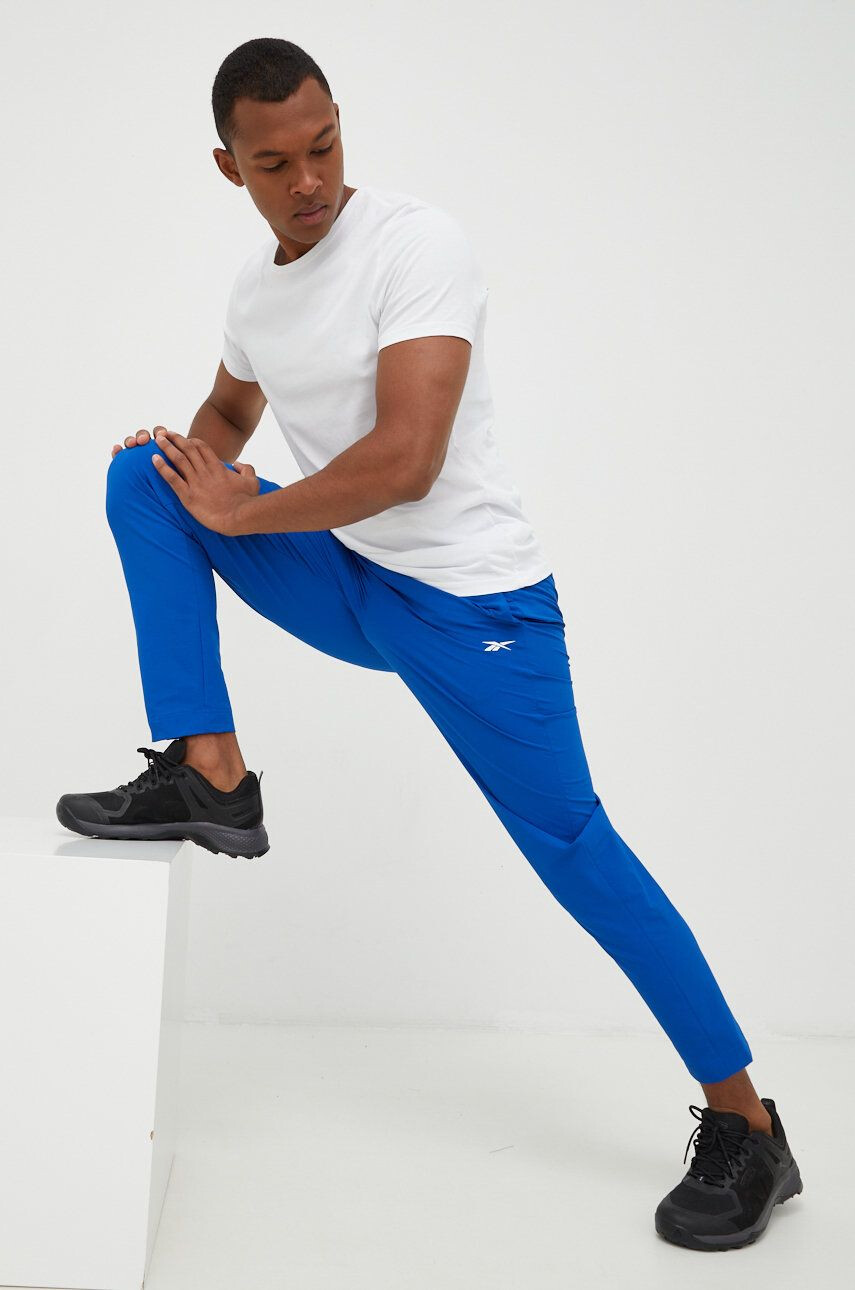 Reebok pantaloni de trening barbati neted - Pled.ro